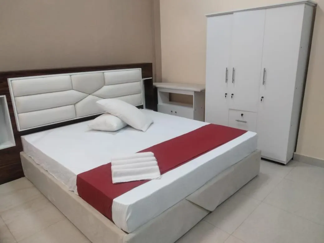 Bed in Gnaanams Hotel and Restaurant