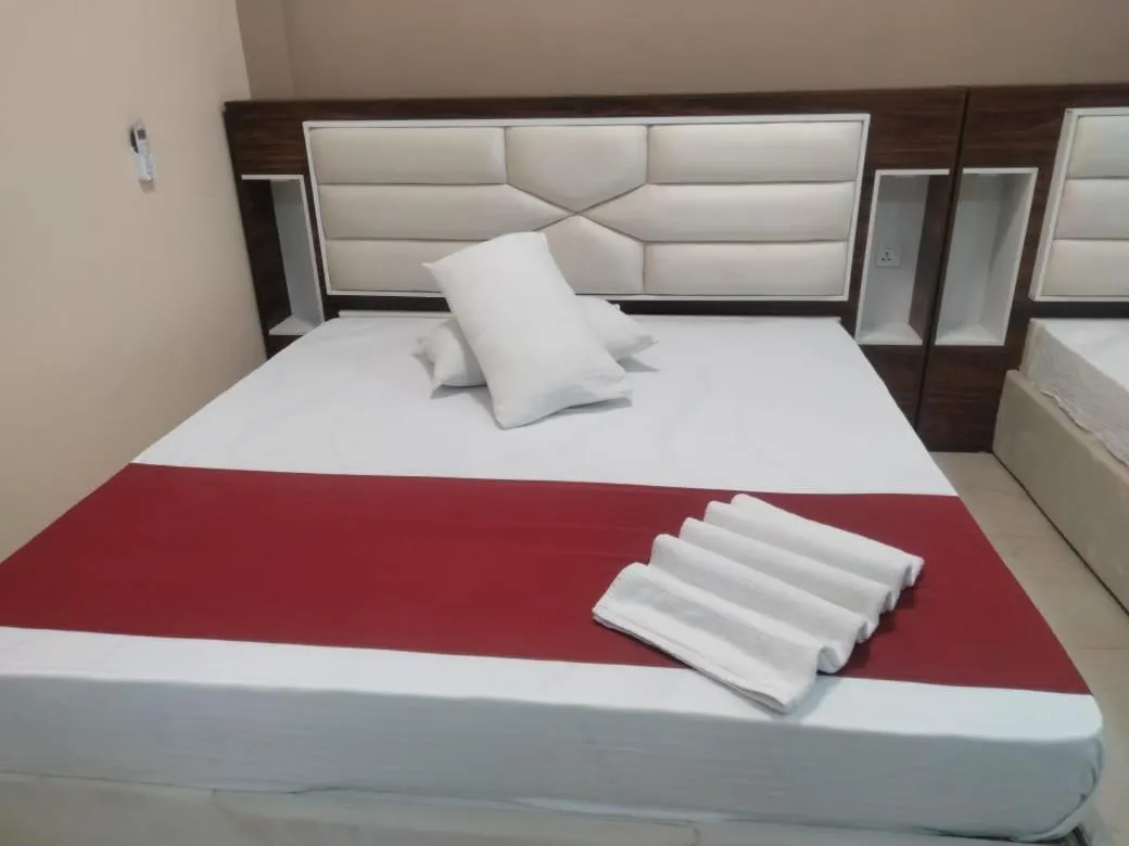 Bed in Gnaanams Hotel and Restaurant