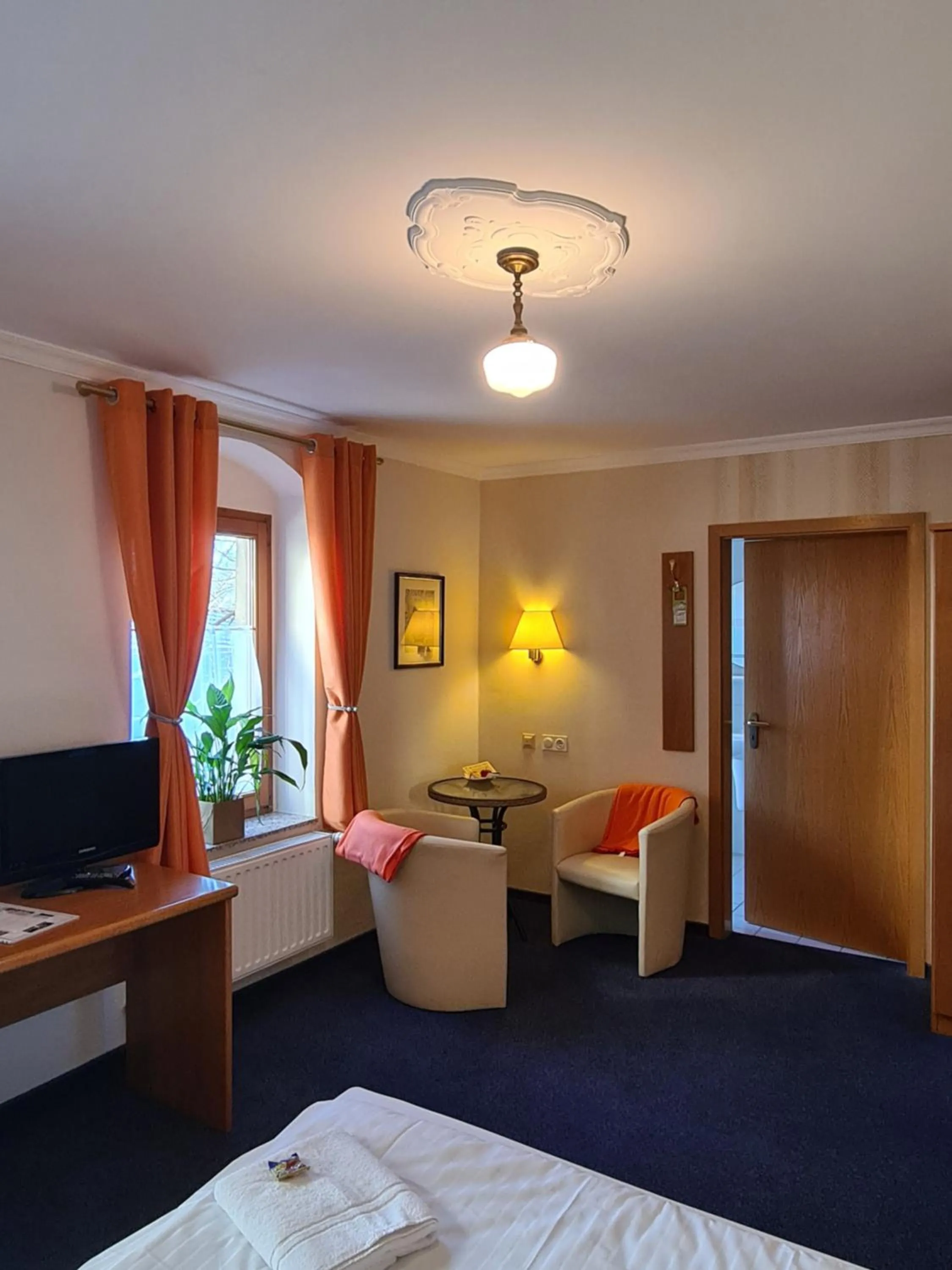 Photo of the whole room, Bed in Hotel Brauhaus Wittenberg