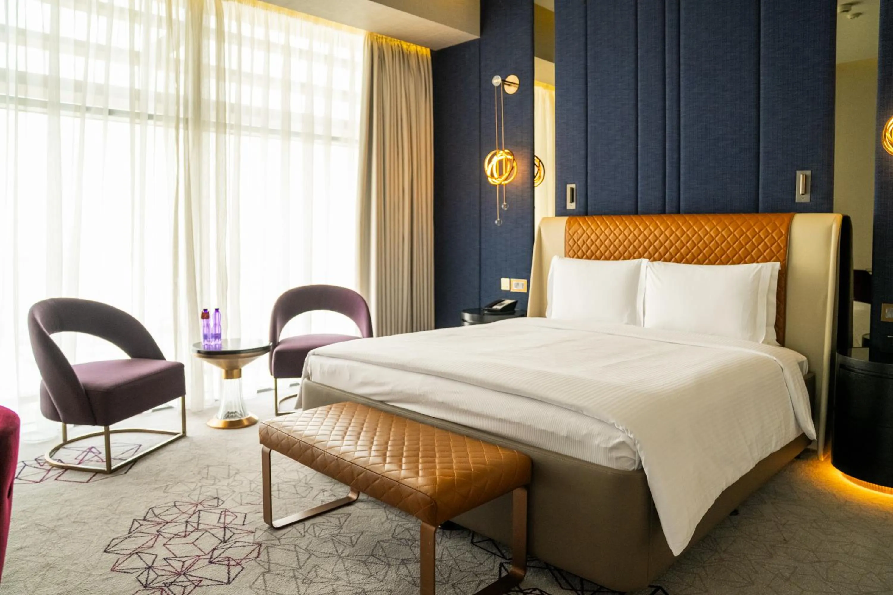Bed in AlRayyan Hotel Doha, Curio Collection by Hilton
