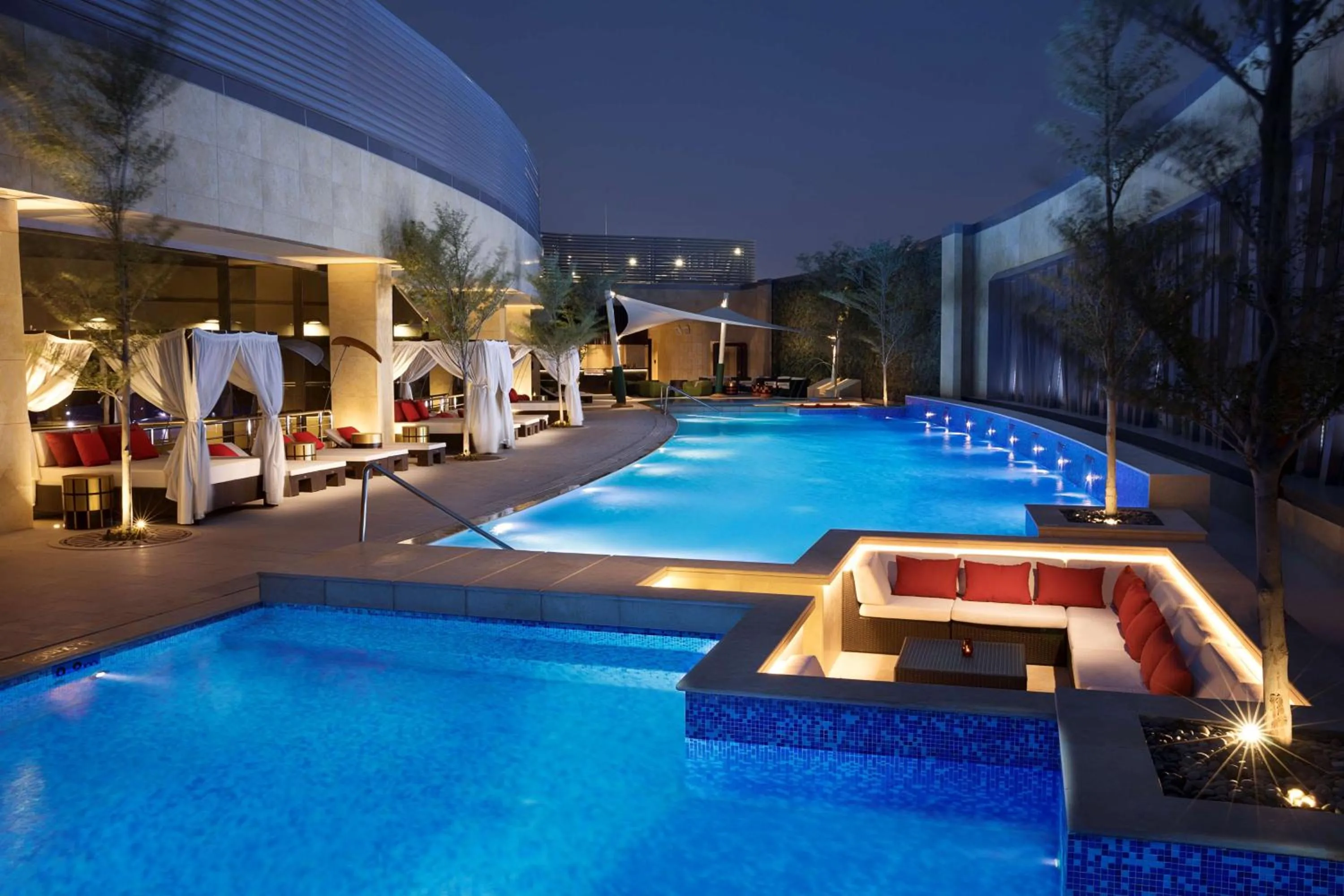 Pool view in AlRayyan Hotel Doha, Curio Collection by Hilton