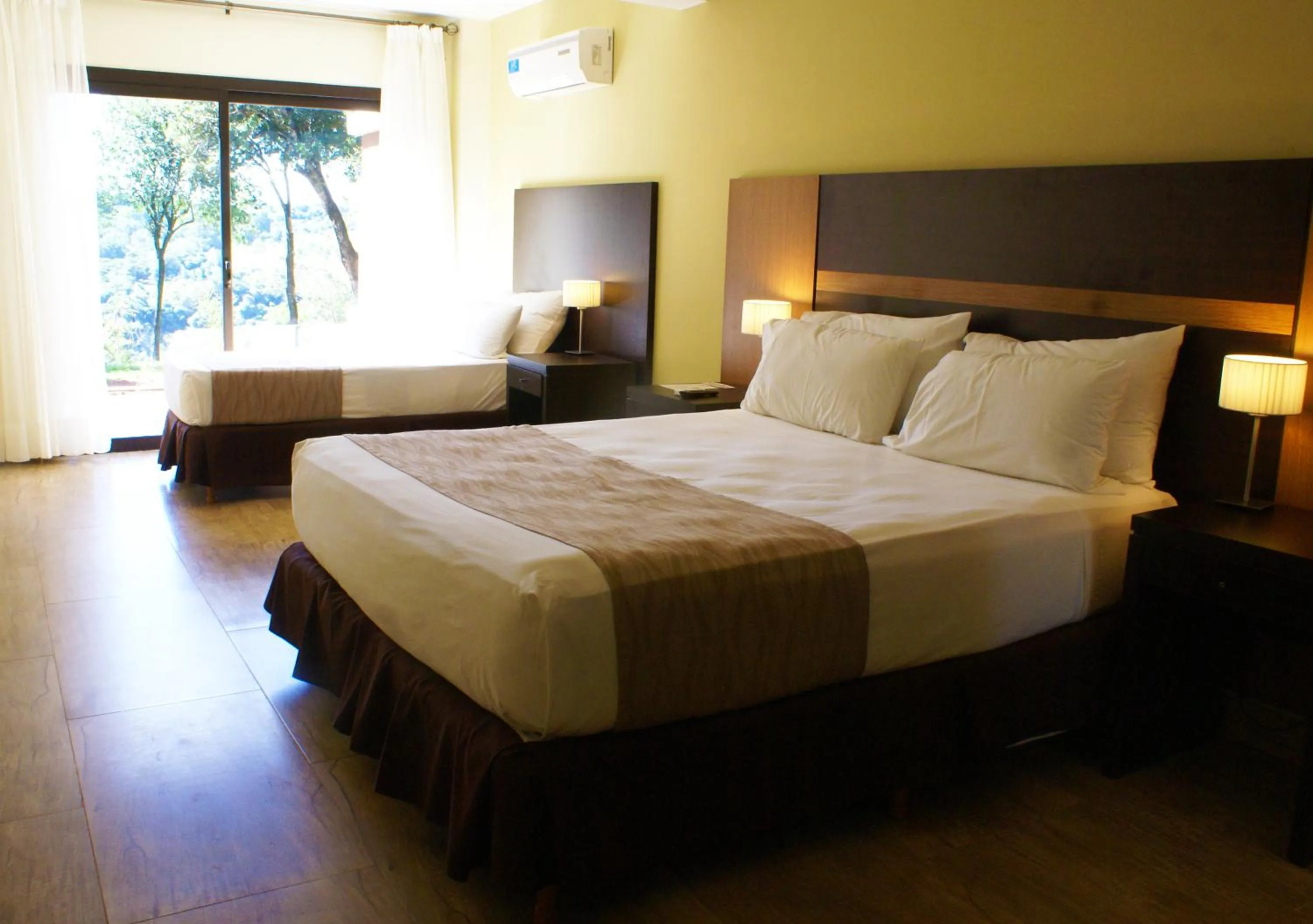 Photo of the whole room, Bed in Pirayu Hotel & Resort