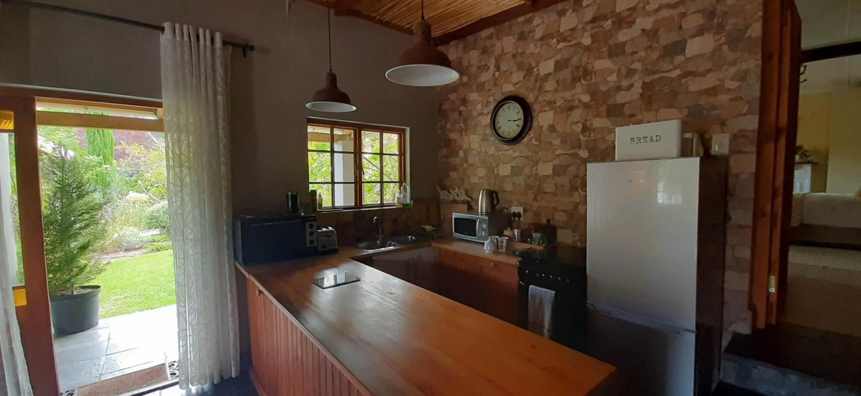 Kitchen or kitchenette in Abigail's Garden Cottage