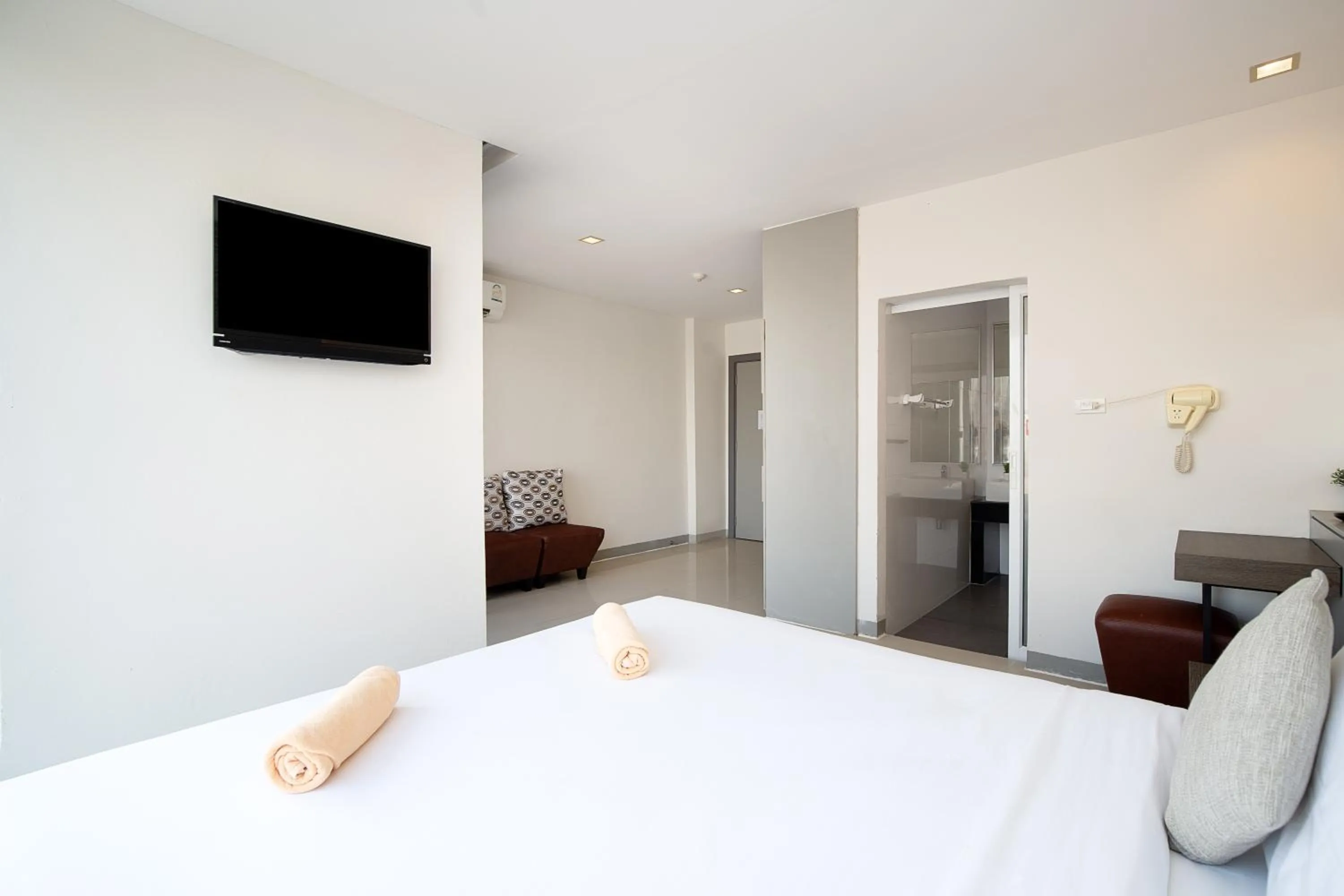 Bed in Leenova Hotel