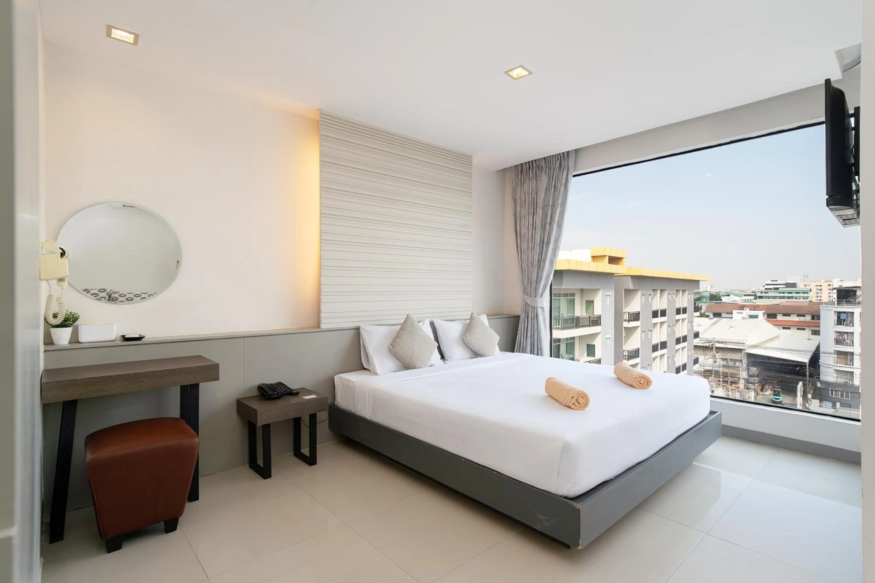 Bed in Leenova Hotel