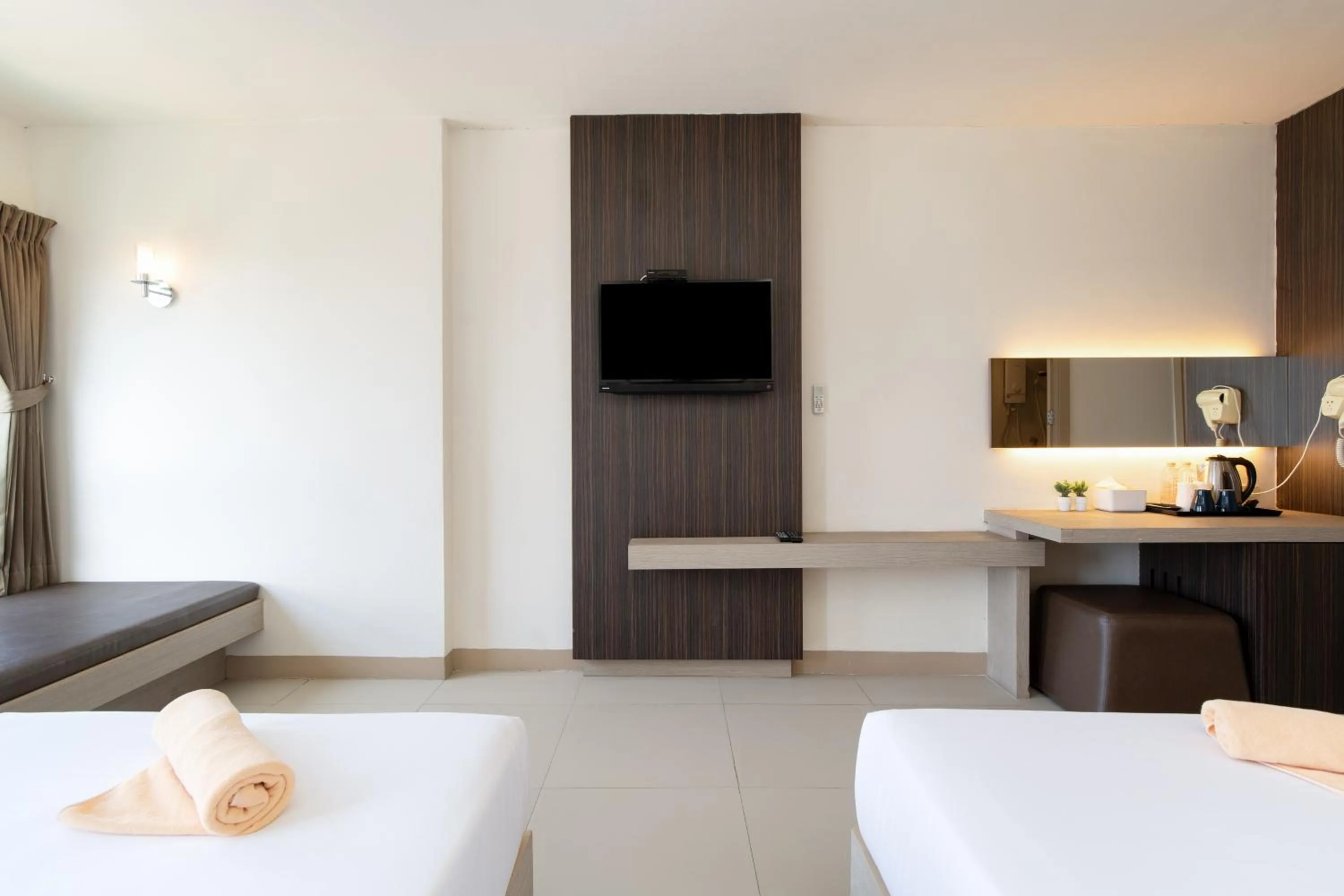 Bed in Leenova Hotel