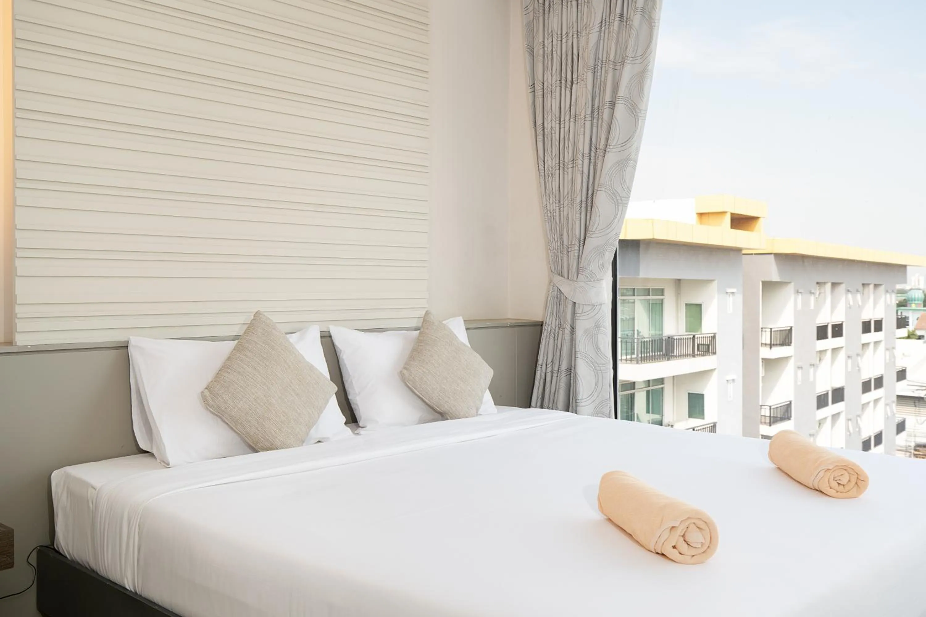 Bed in Leenova Hotel