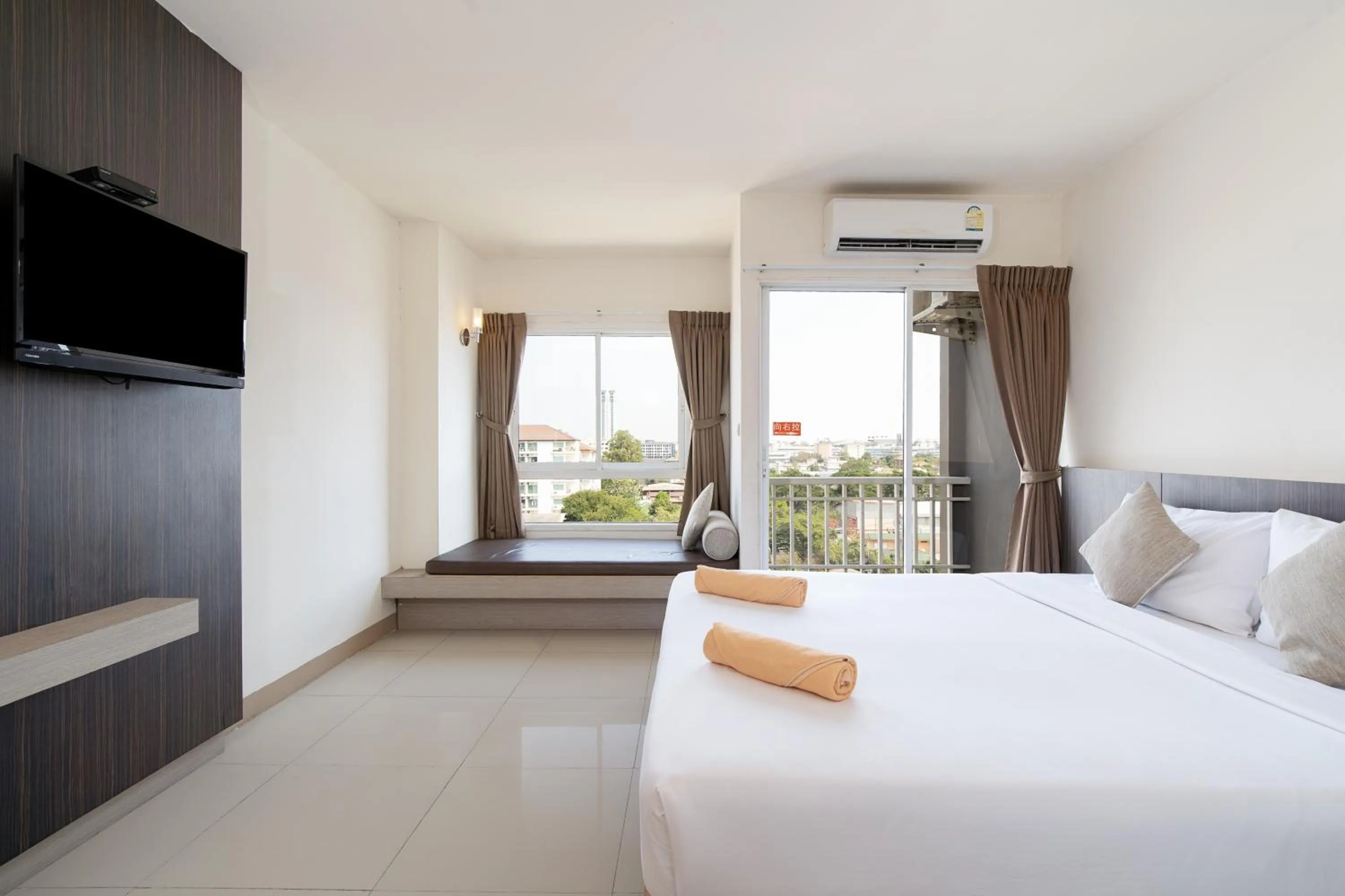 Bed in Leenova Hotel