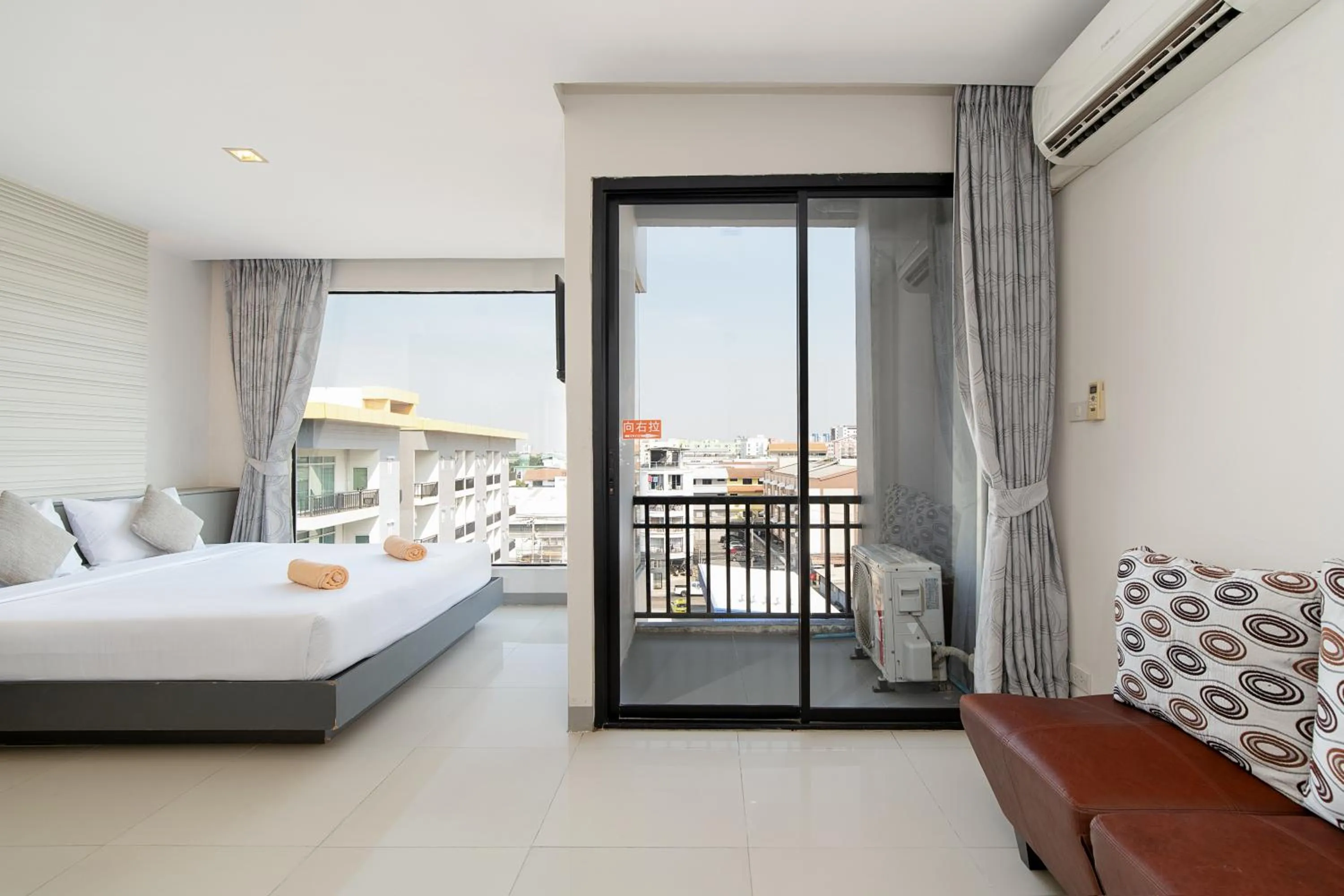 Bed in Leenova Hotel