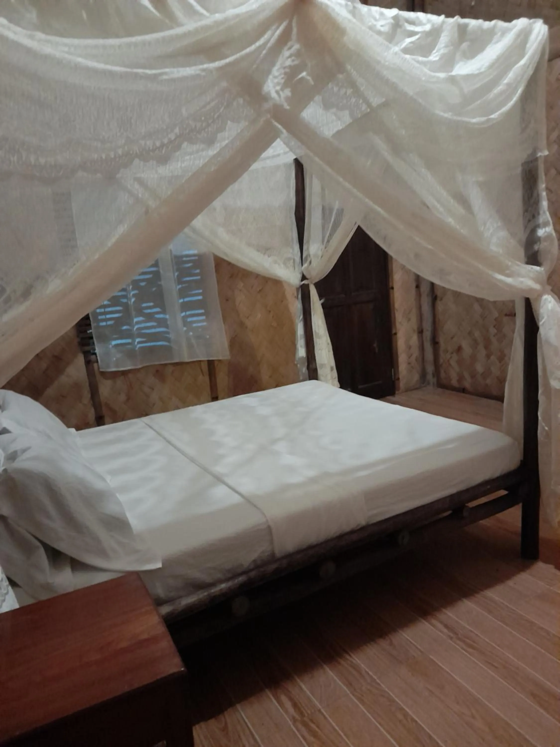 Bed in Erlittop Nature Lodge