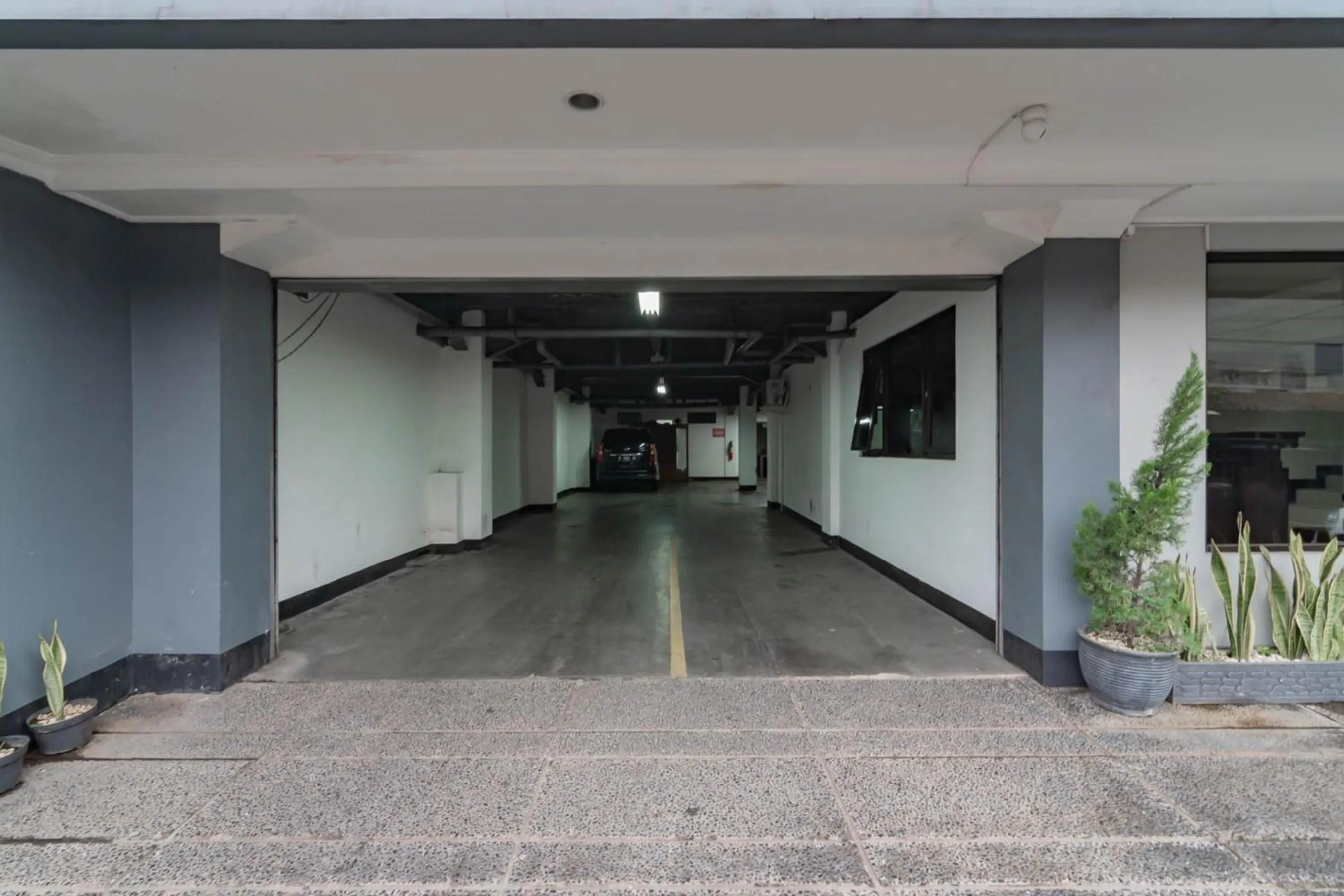 Parking in RedDoorz Plus at Buah Batu