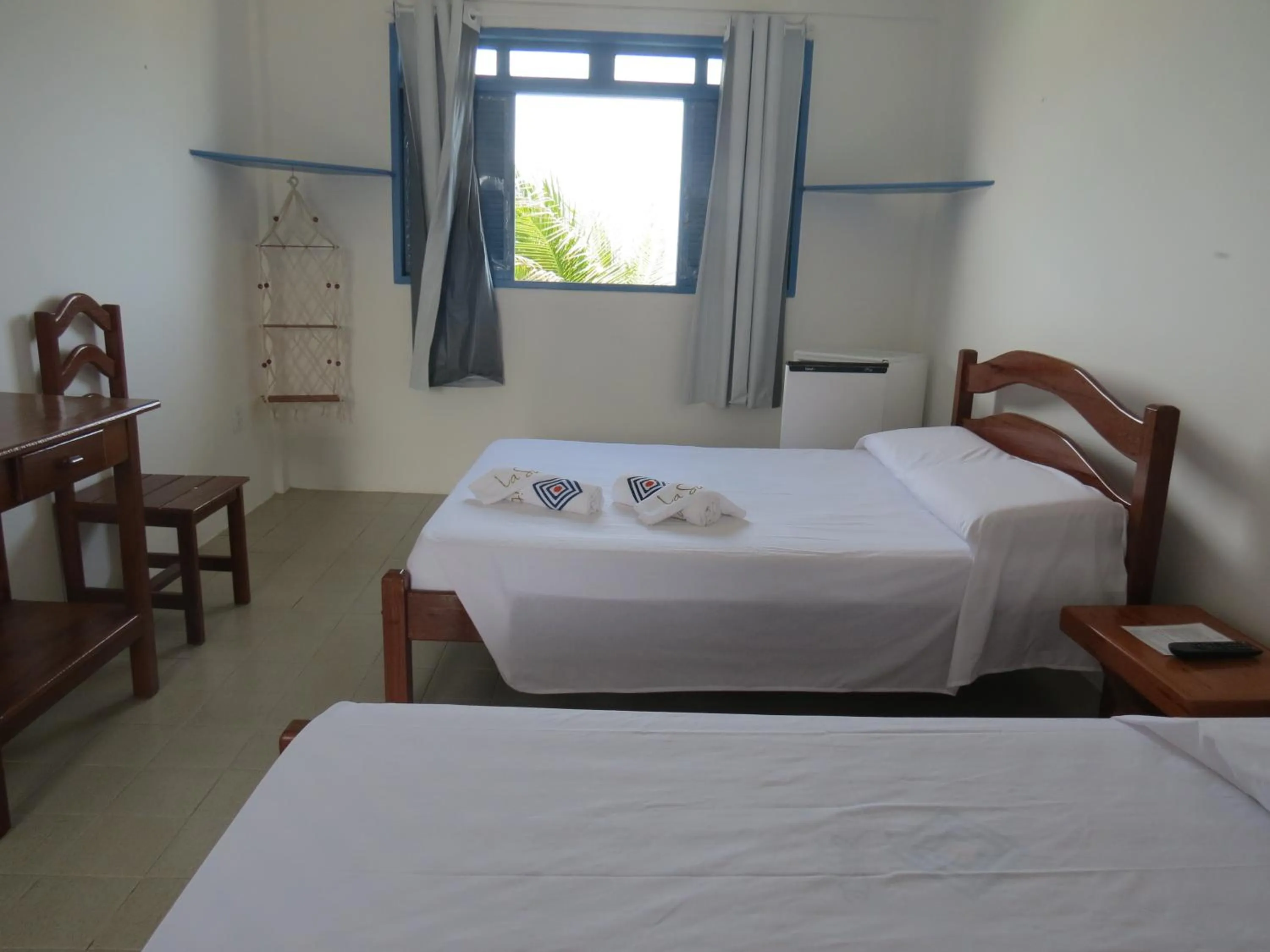 Photo of the whole room, Bed in La Suite Praia Hotel