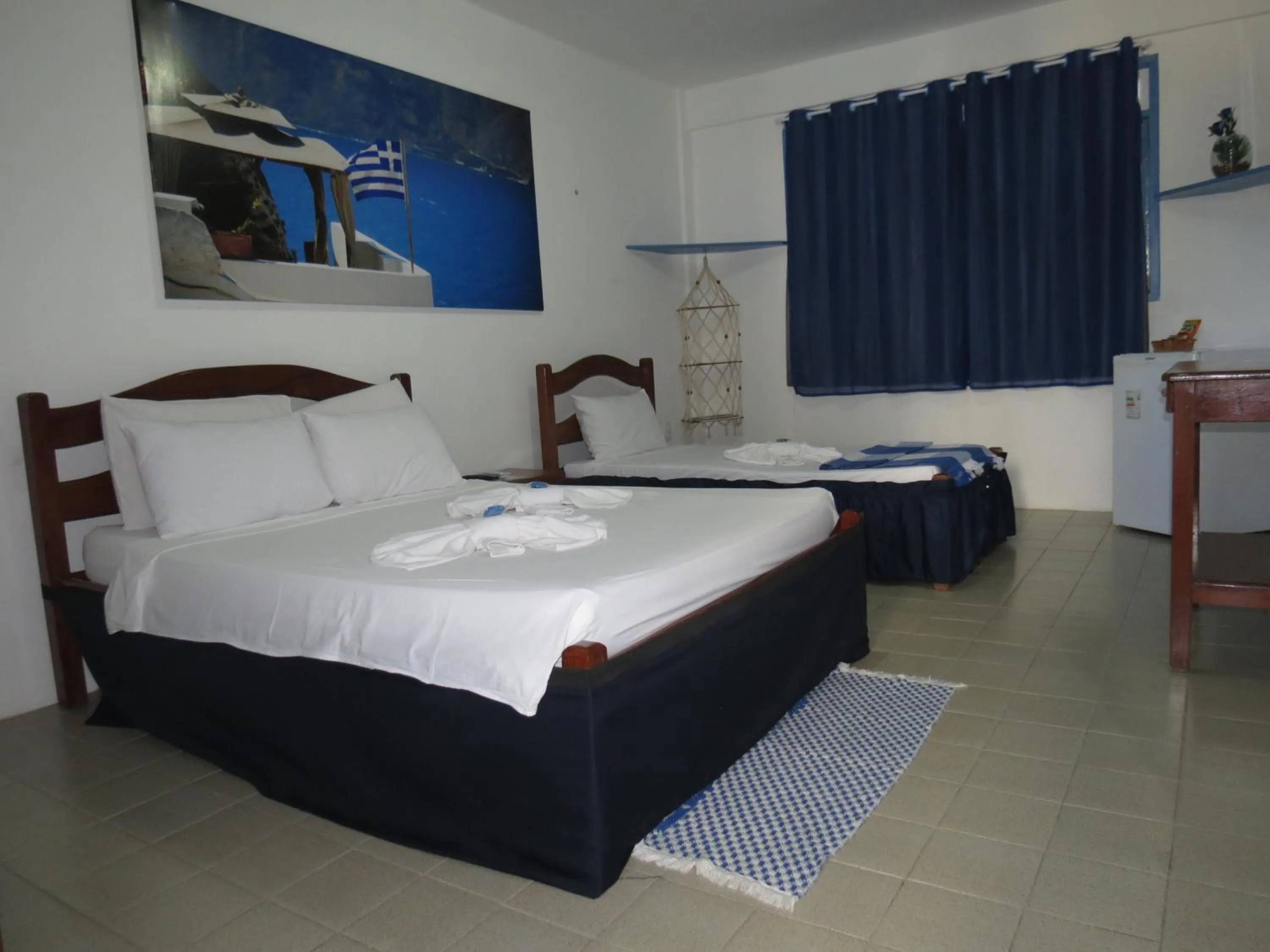 Photo of the whole room, Bed in La Suite Praia Hotel