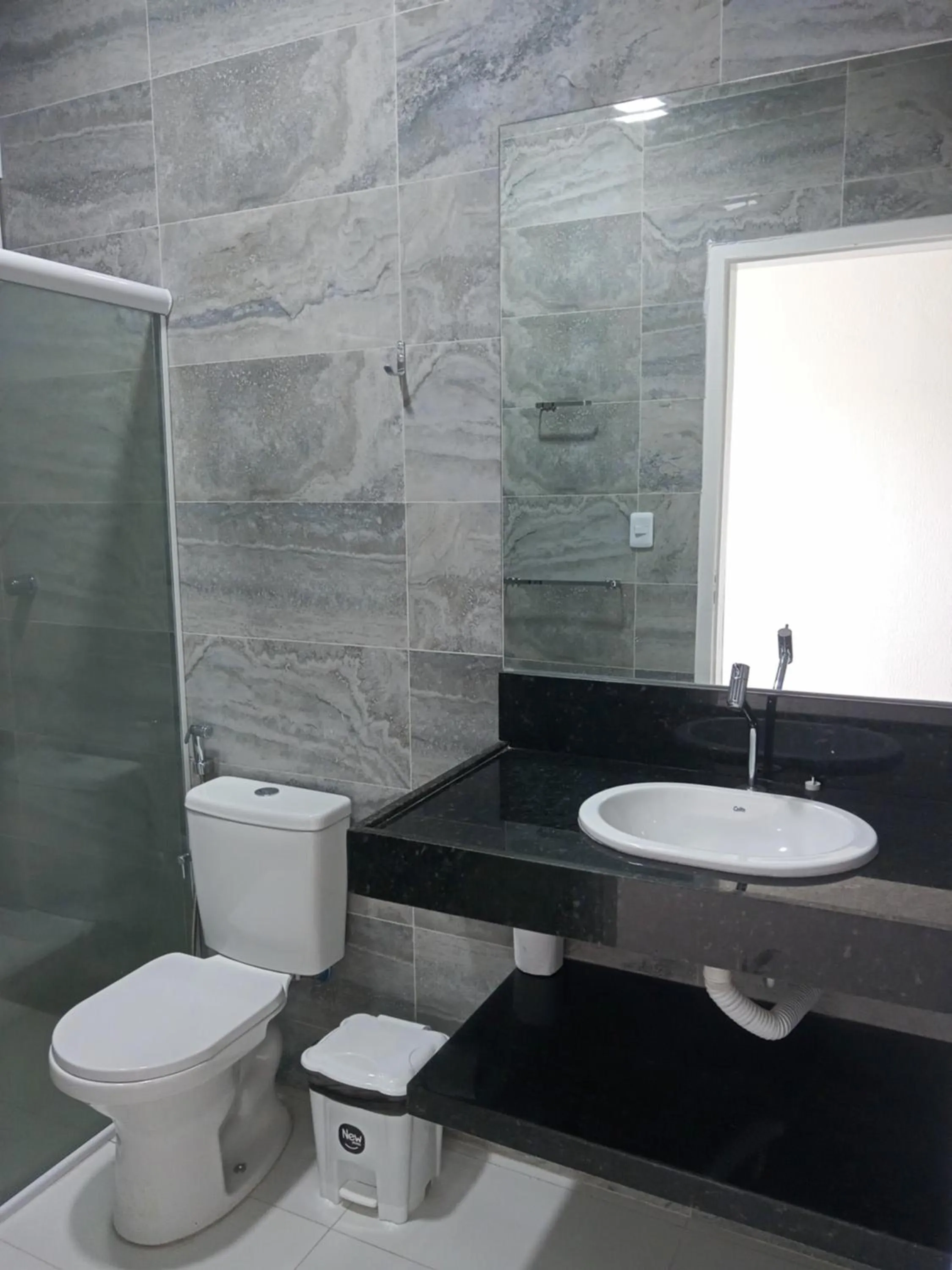 Bathroom in La Suite Praia Hotel