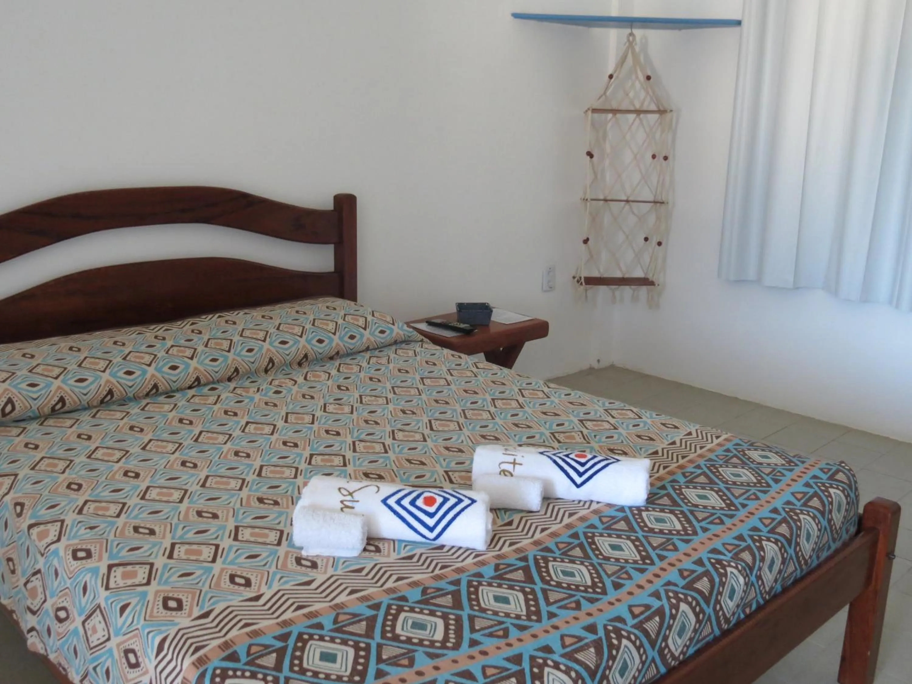 Photo of the whole room, Bed in La Suite Praia Hotel