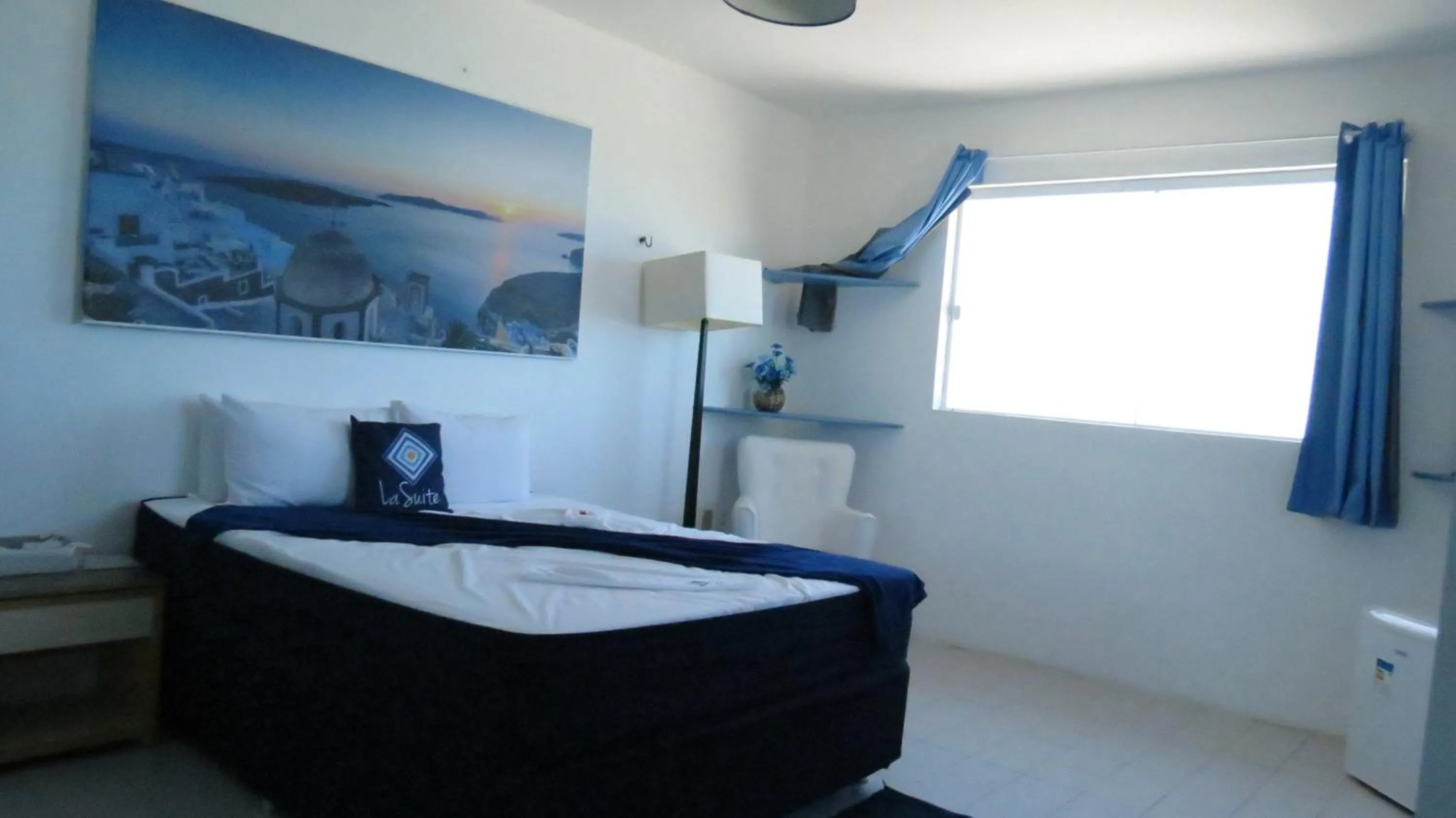 Photo of the whole room, Bed in La Suite Praia Hotel