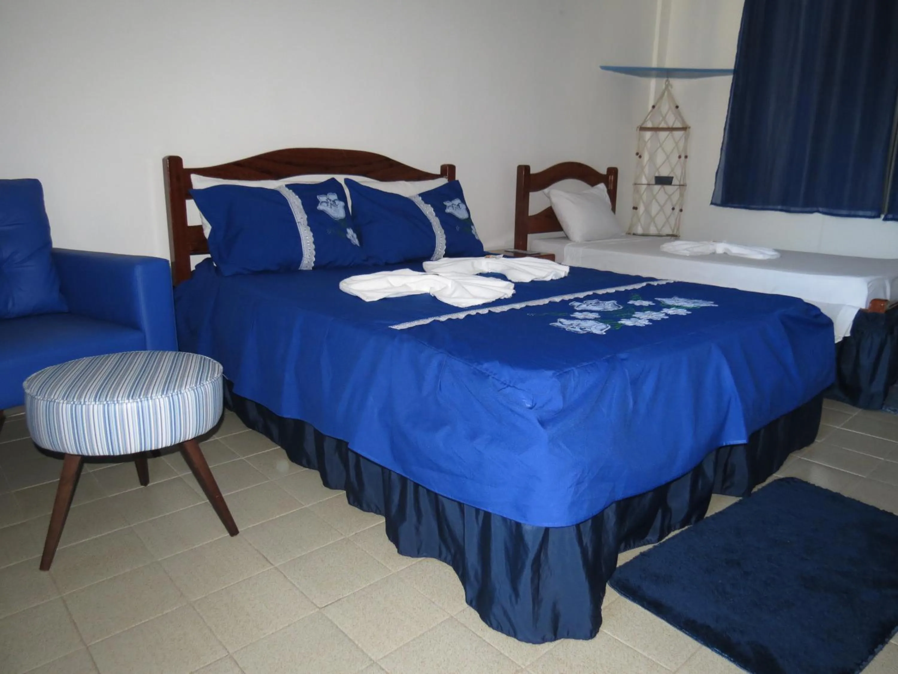 Photo of the whole room, Bed in La Suite Praia Hotel