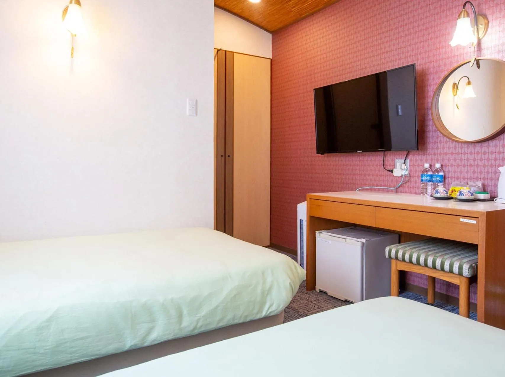 Bed in Shinnishiki Hotel