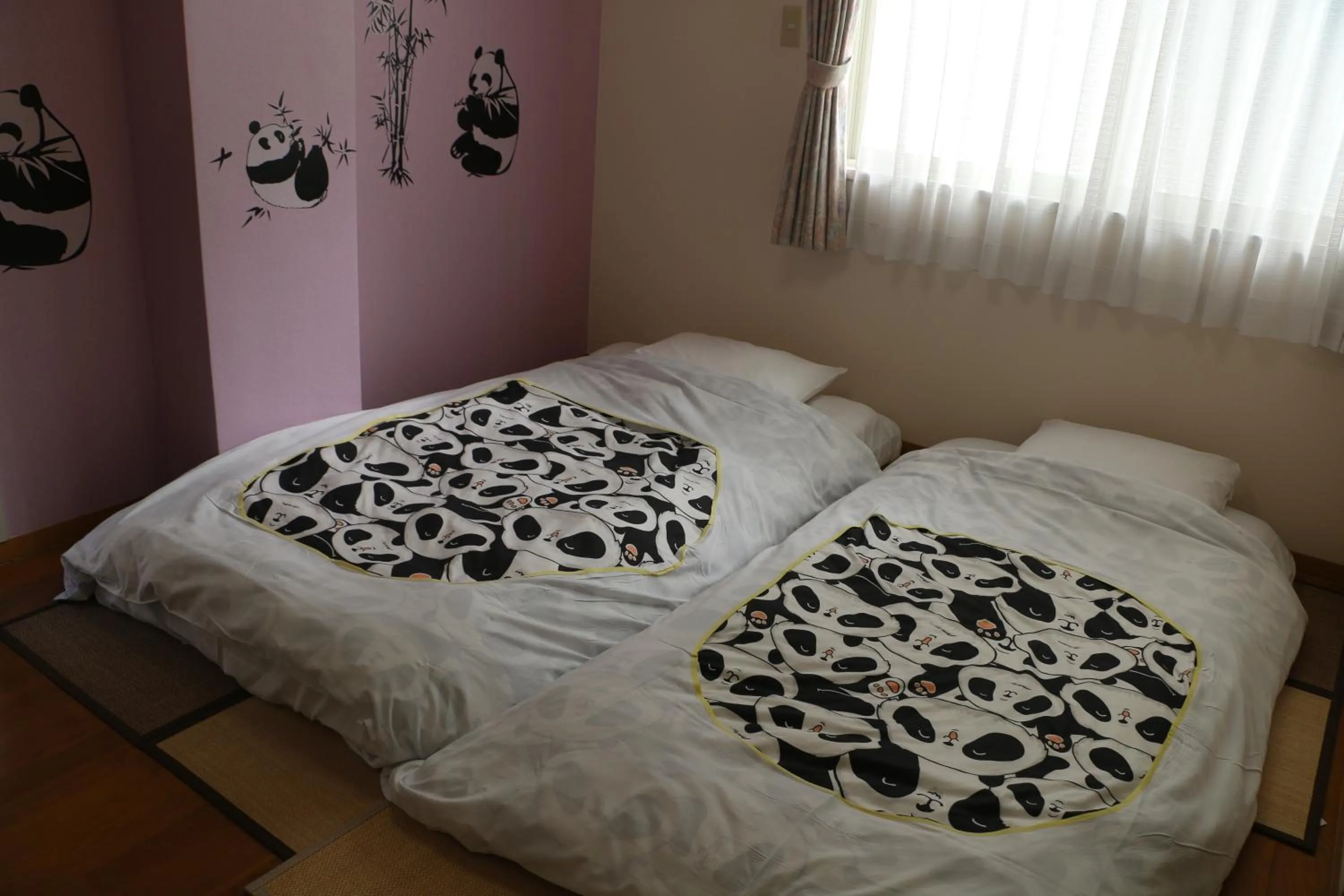 Bed in Shinnishiki Hotel