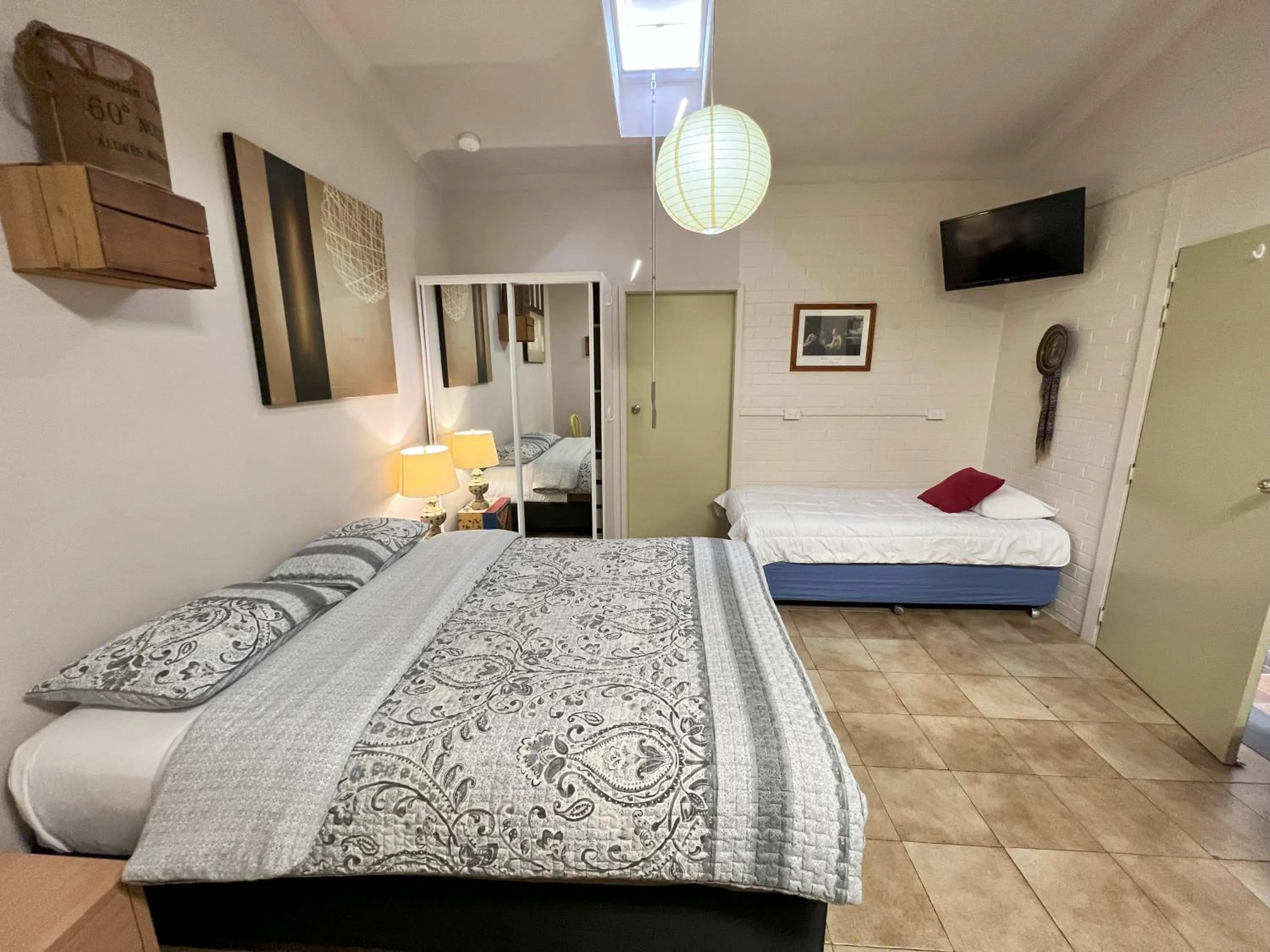 Bed in Westside Studio Apartments