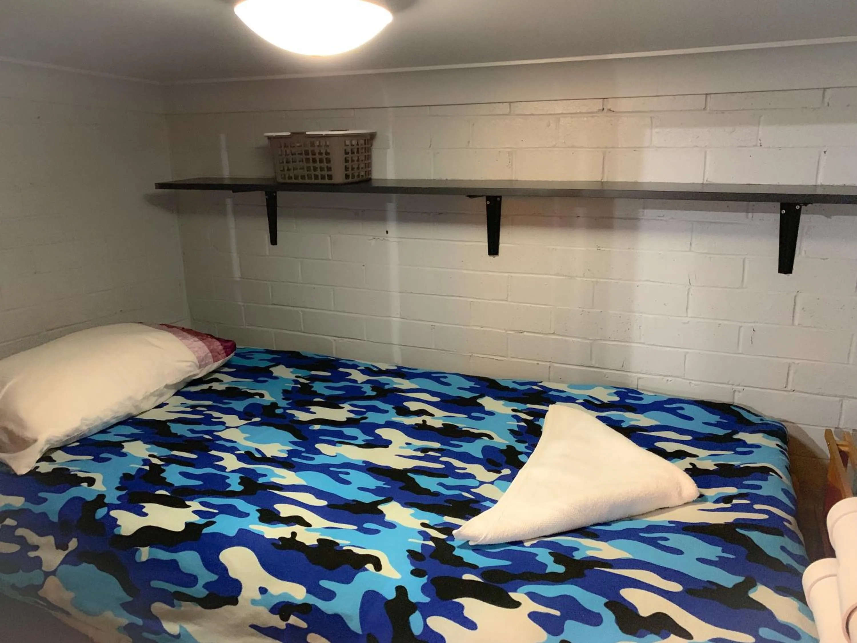 Bed in Westside Studio Apartments