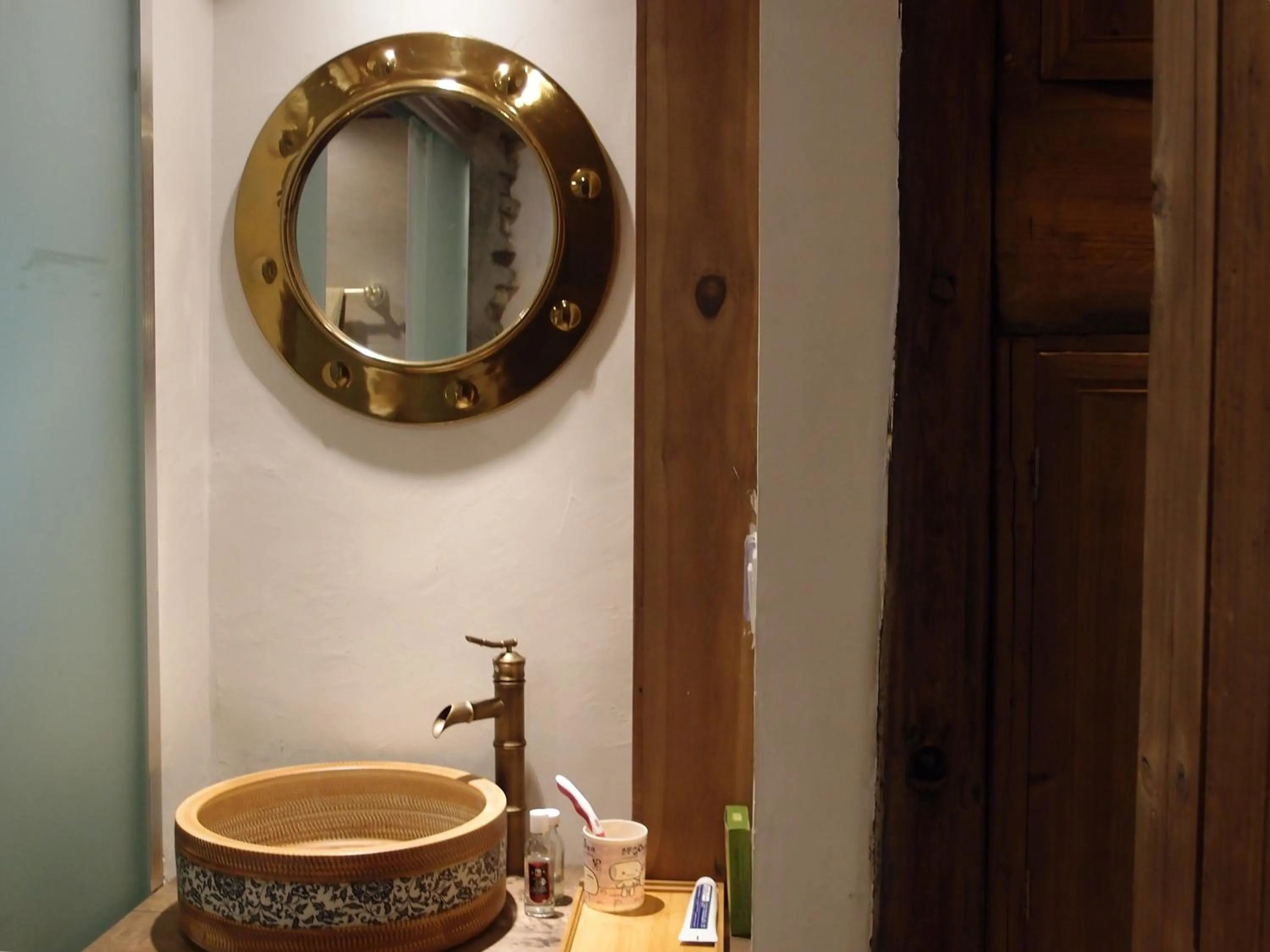 Bathroom in WuYuan QiYe YanXiang Guesthouse