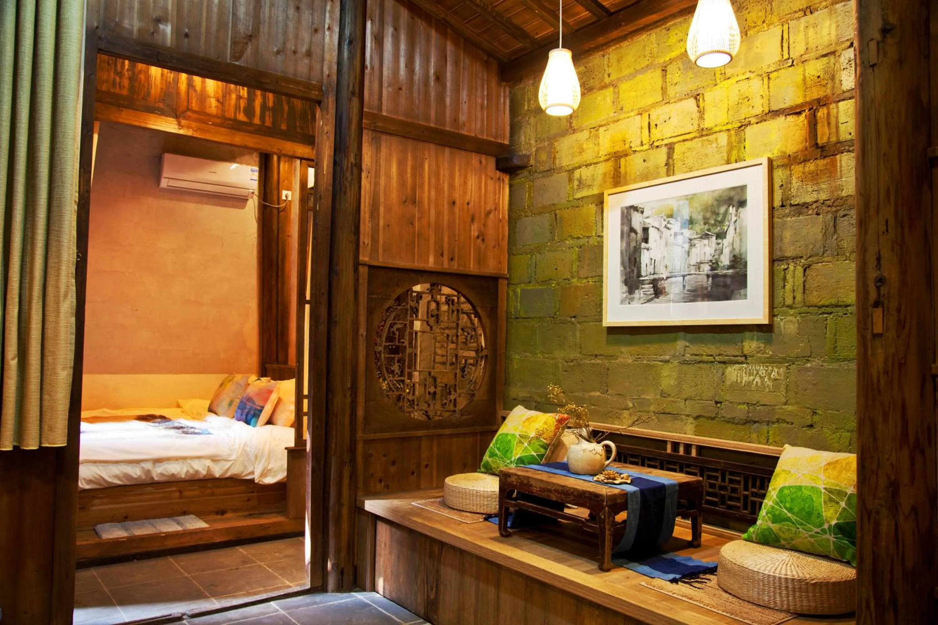 Seating area, Bed in WuYuan QiYe YanXiang Guesthouse