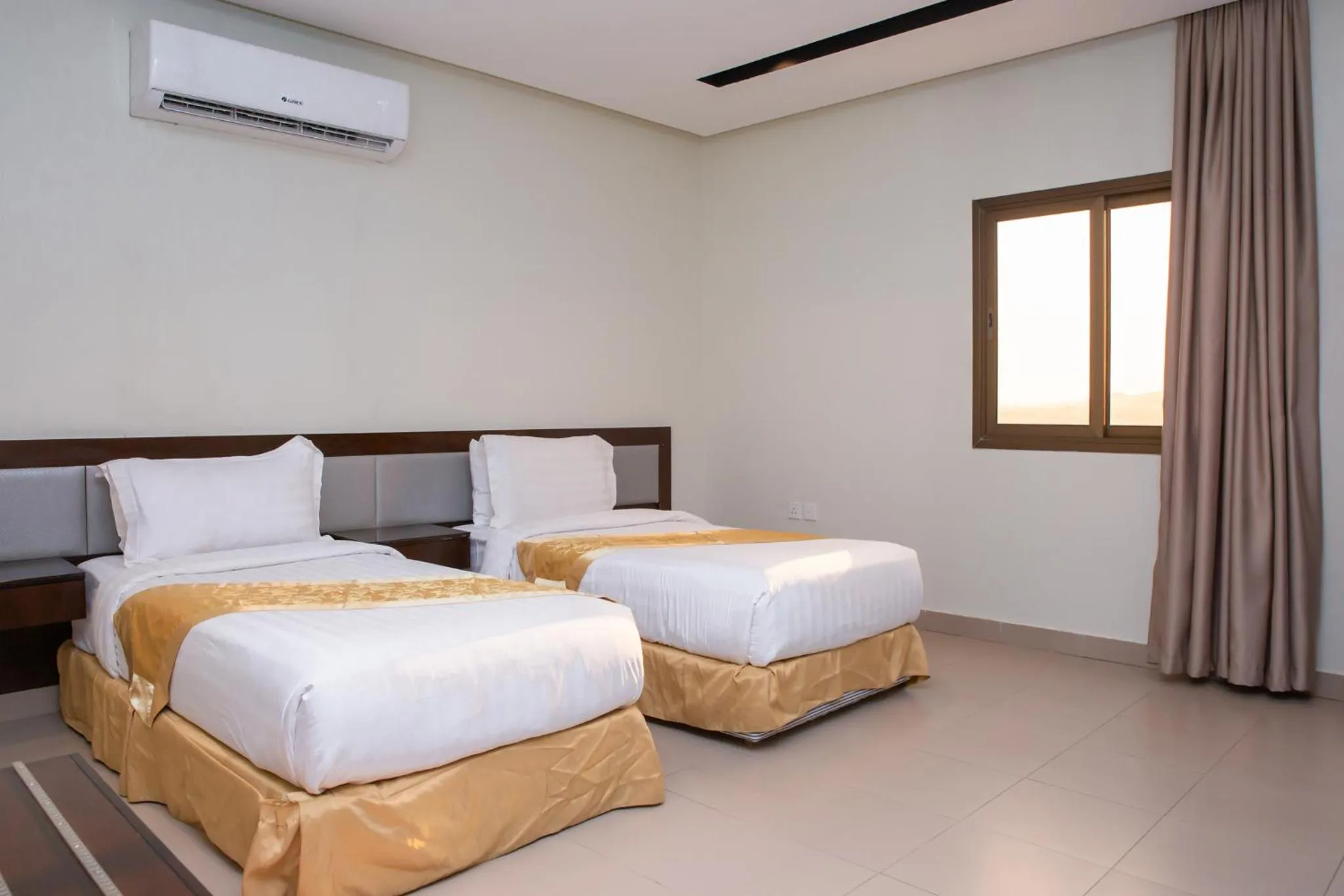 Bed in Triple Tree Serviced Units