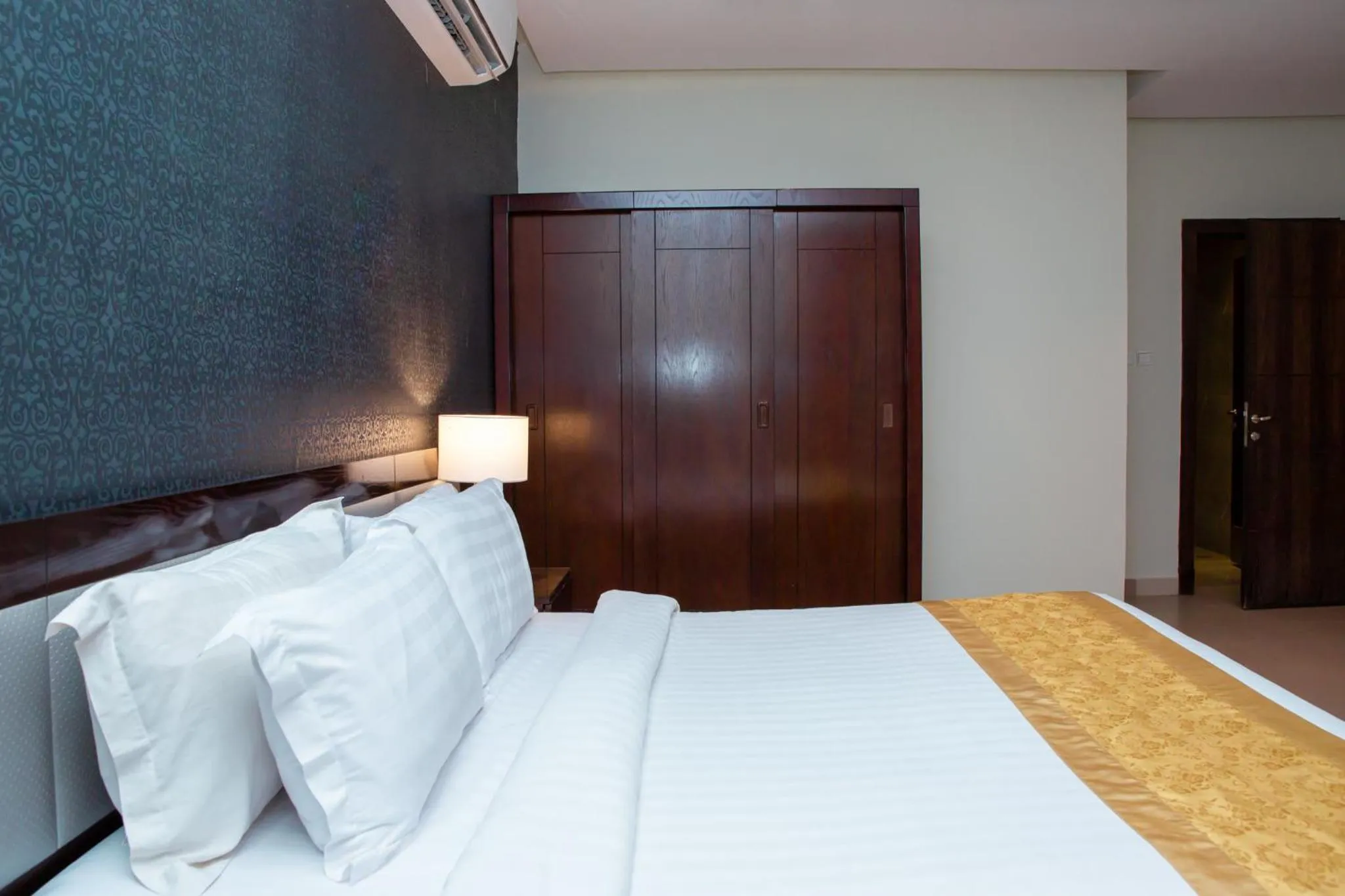 Bed in Triple Tree Serviced Units