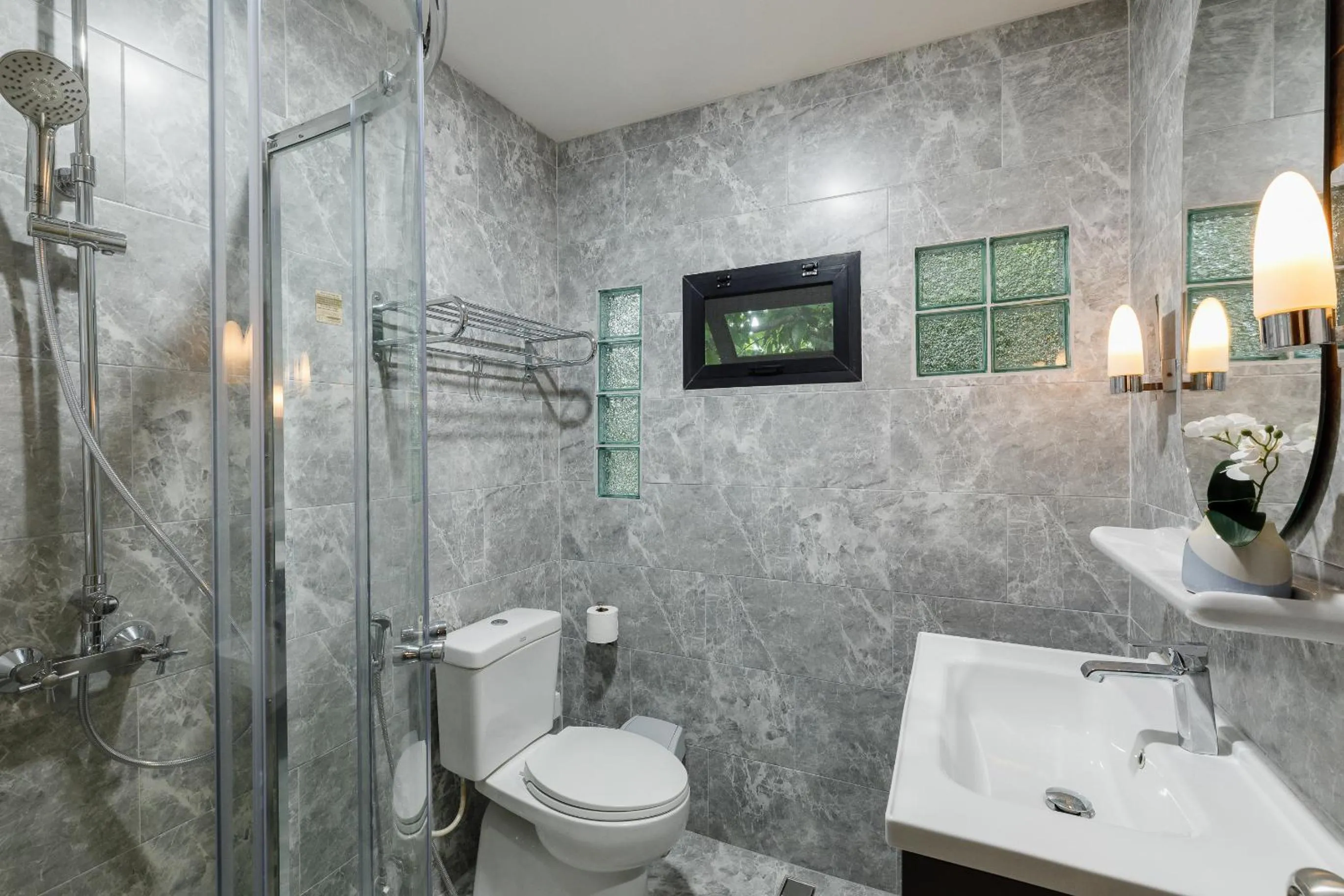 Bathroom in Le Charcoa Hotel