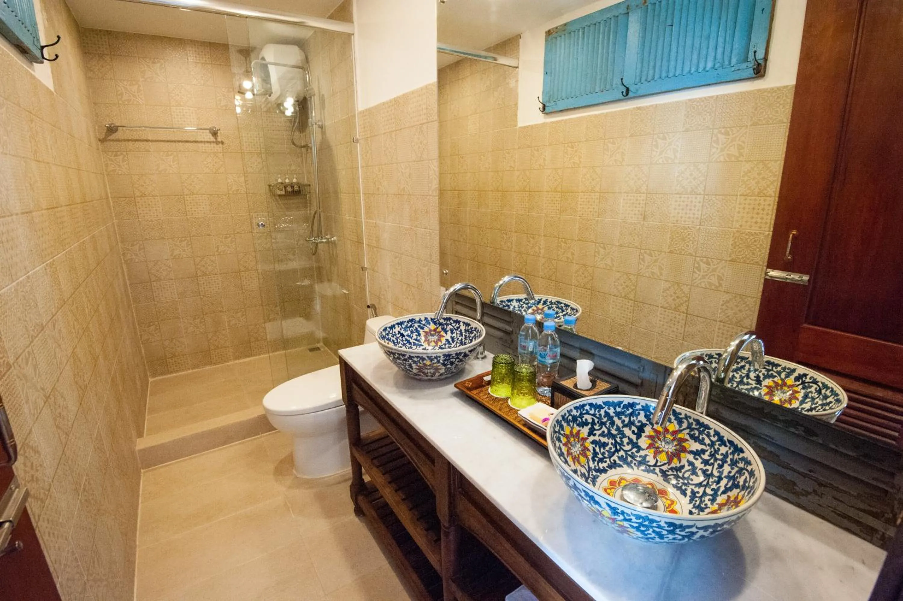 Shower in Khmer Surin Boutique Guesthouse