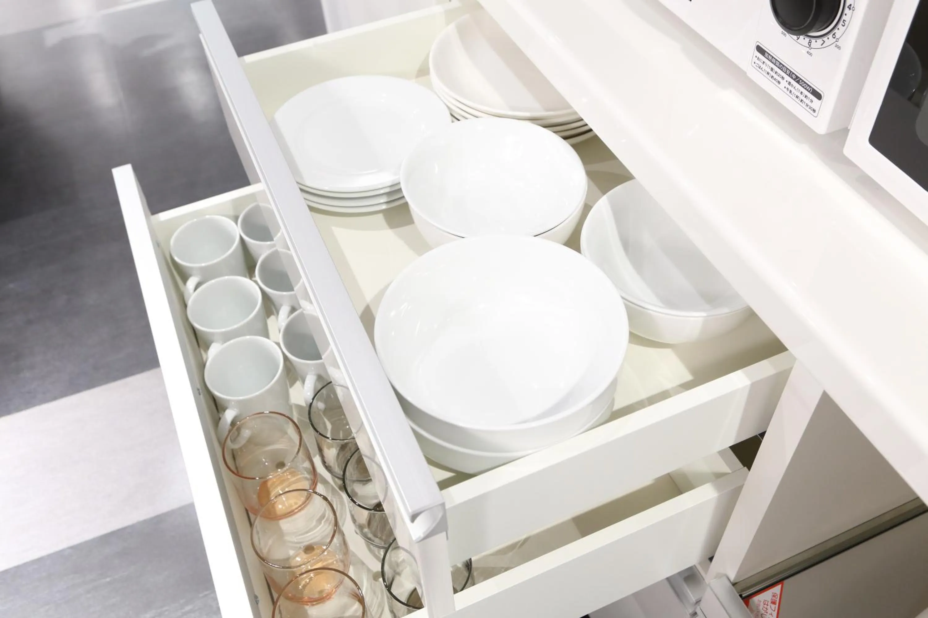 Communal kitchen in Oak Hotel Edo