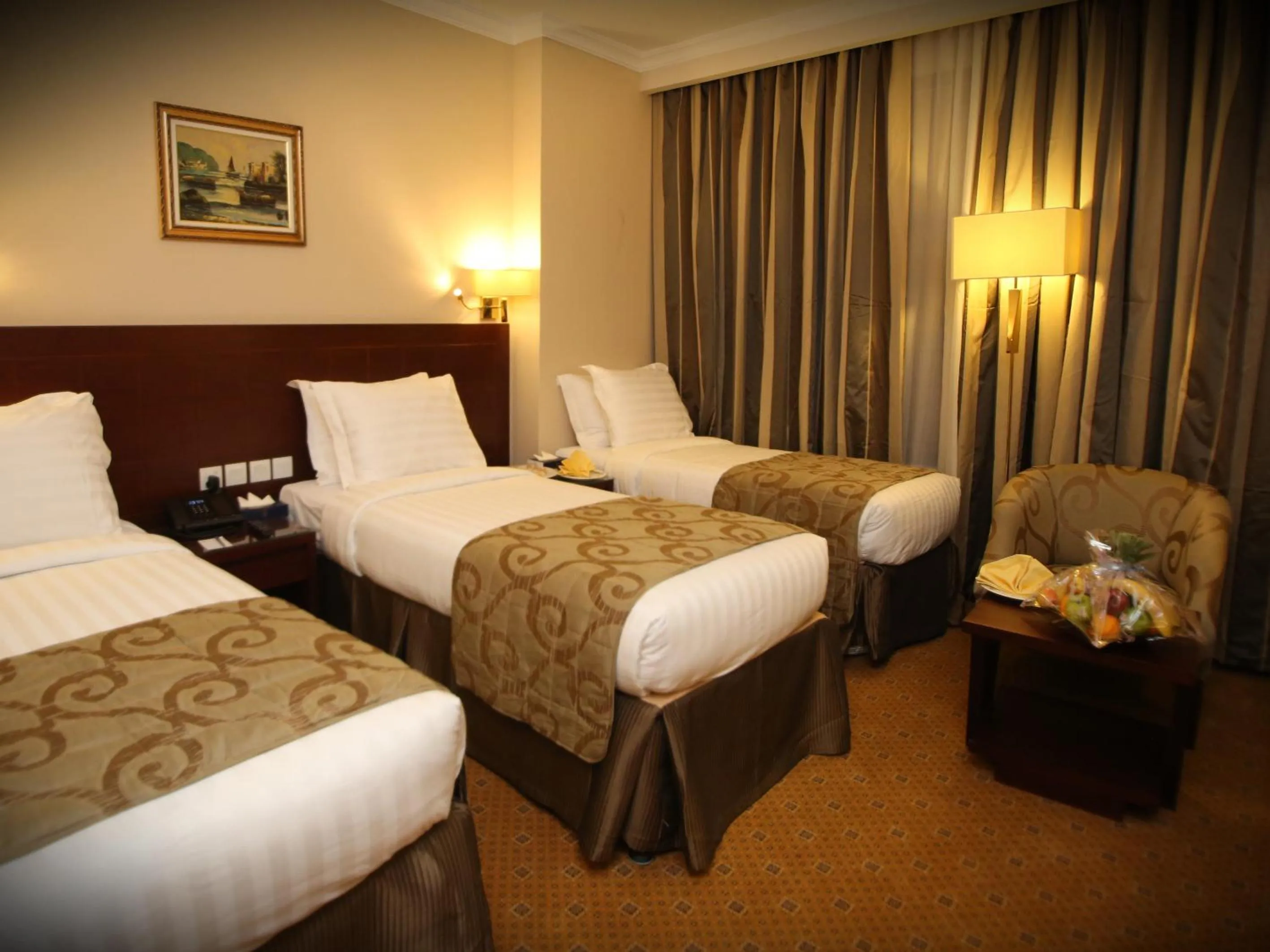 Bed in Al Aqeeq Al Rawda Hotel by Abu Al Joud