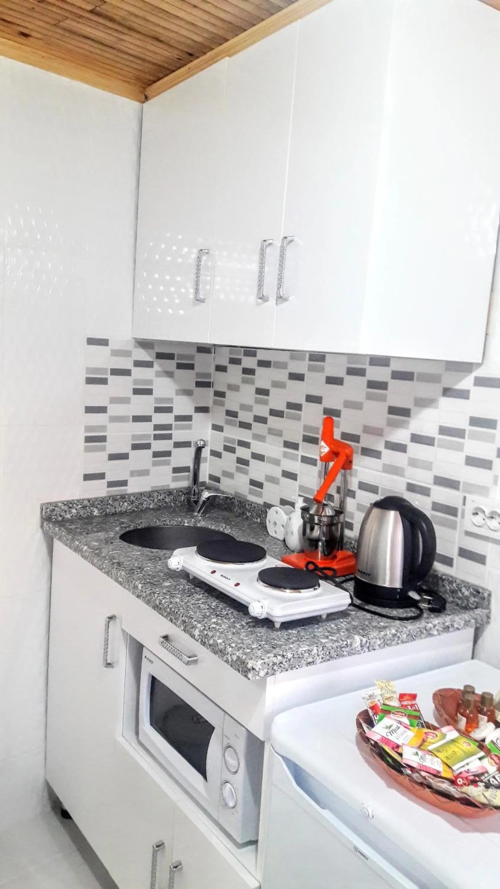 Kitchen or kitchenette in Golden Life Apart Hotel
