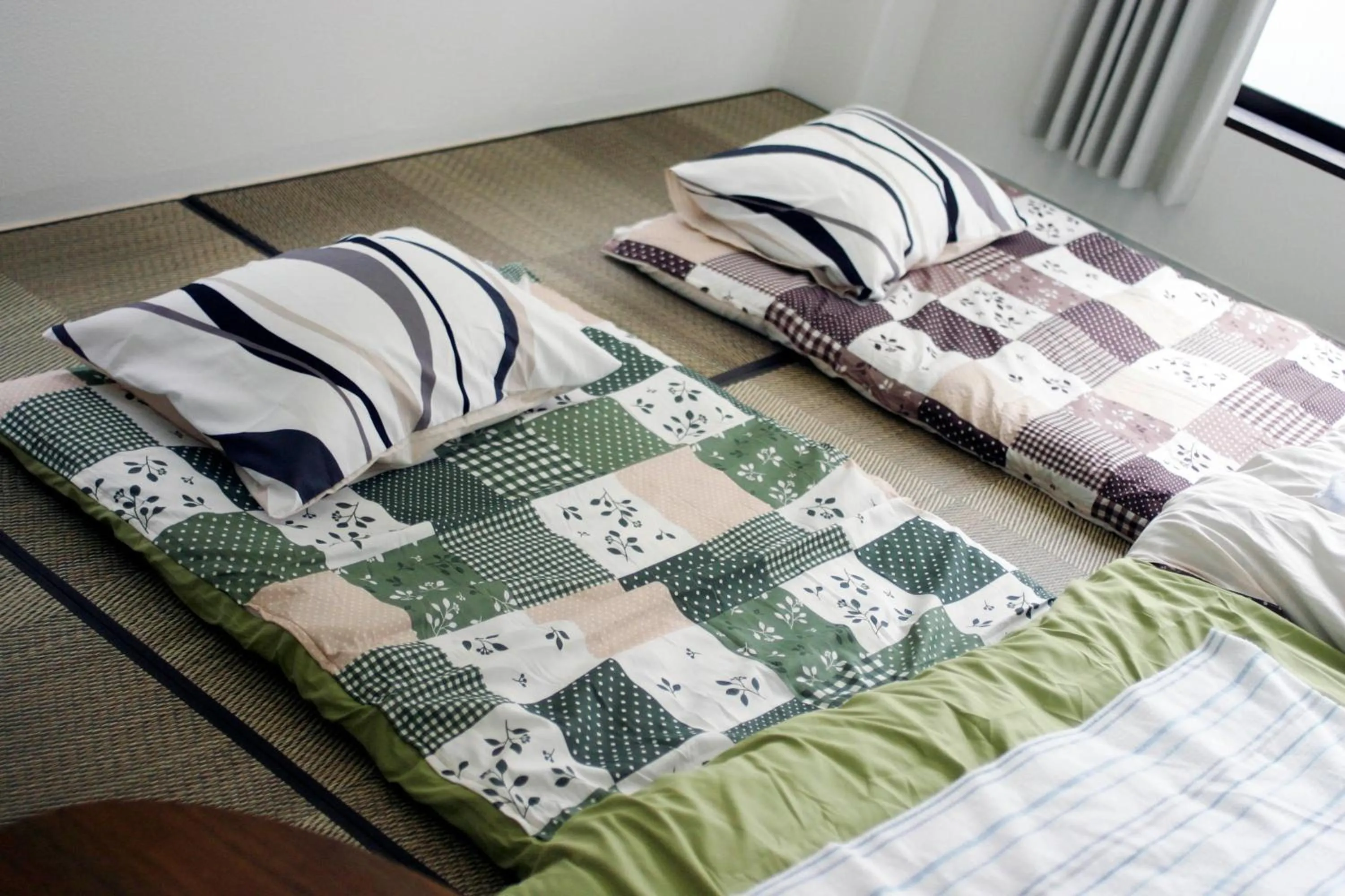 Bed in Guesthouse Sensu