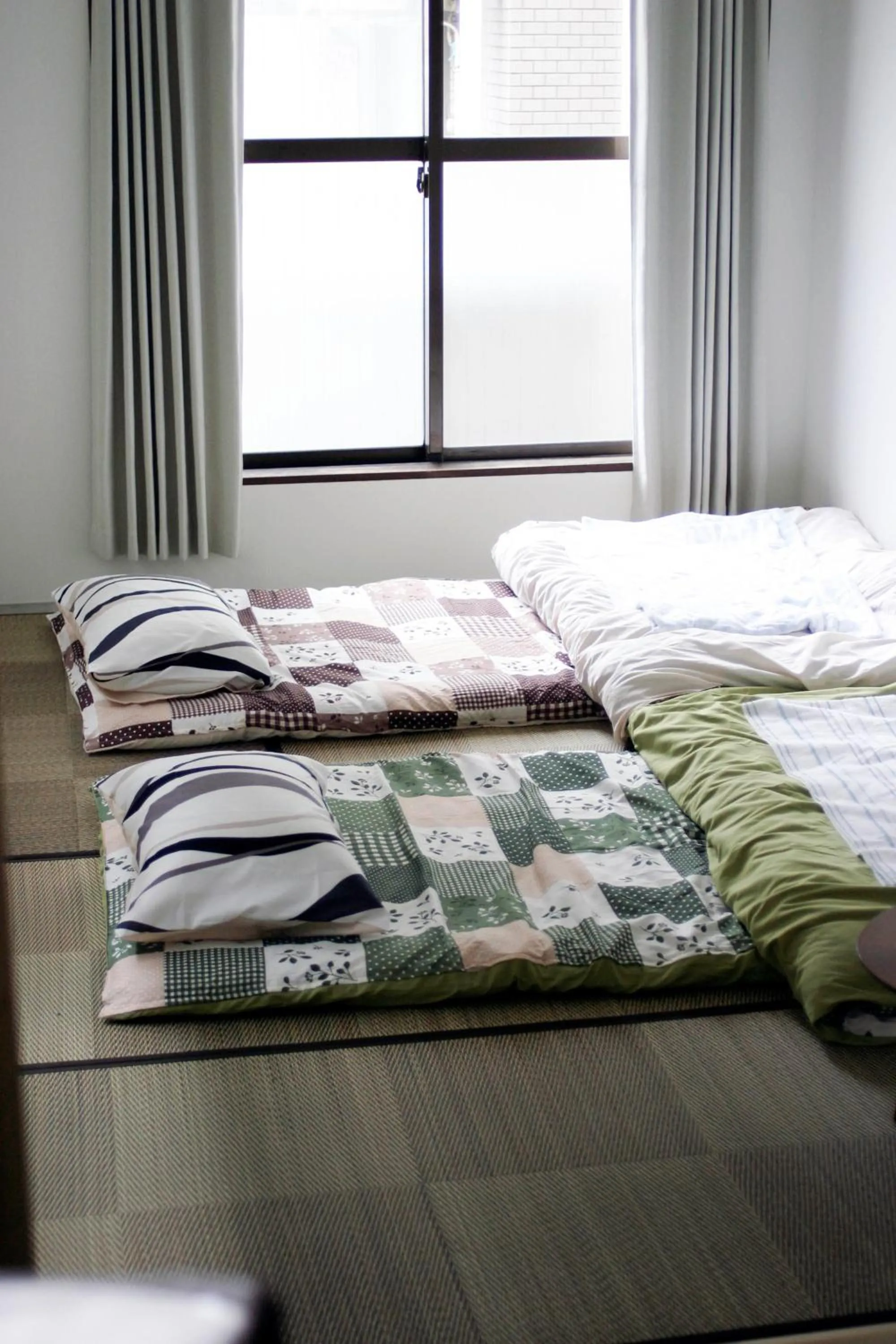 Bed in Guesthouse Sensu