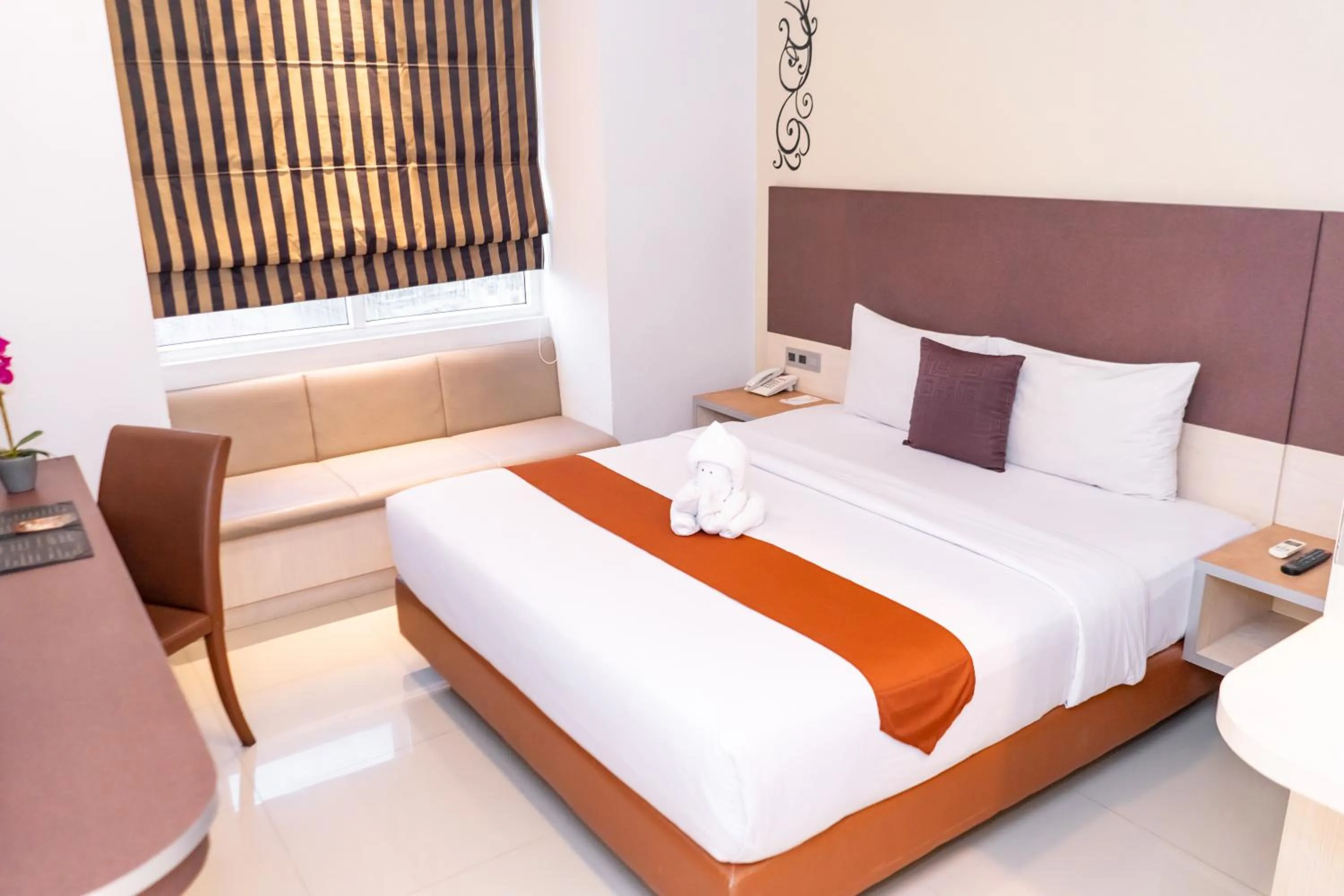Bed in Sparks Odeon Sukabumi, ARTOTEL Curated