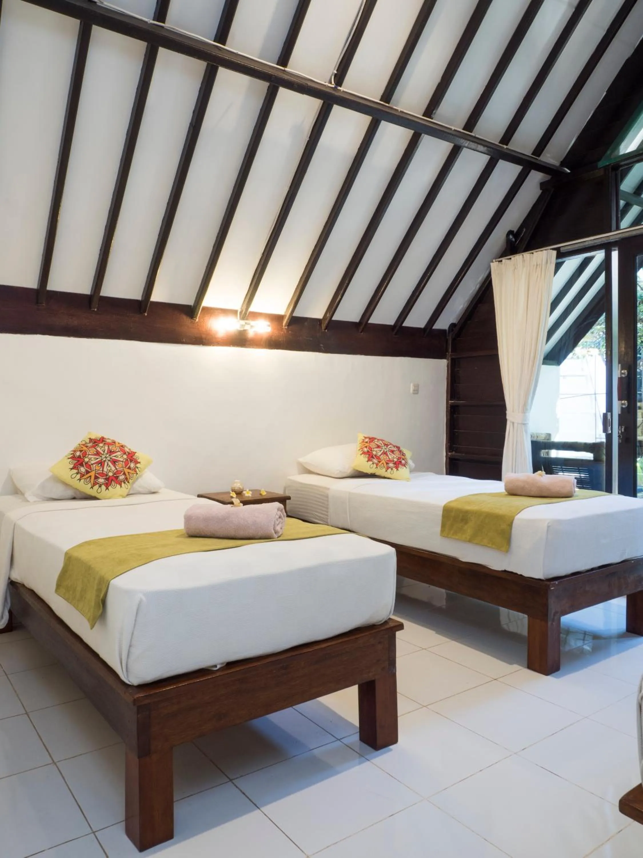 Bed in Gili Turtle Beach Resort