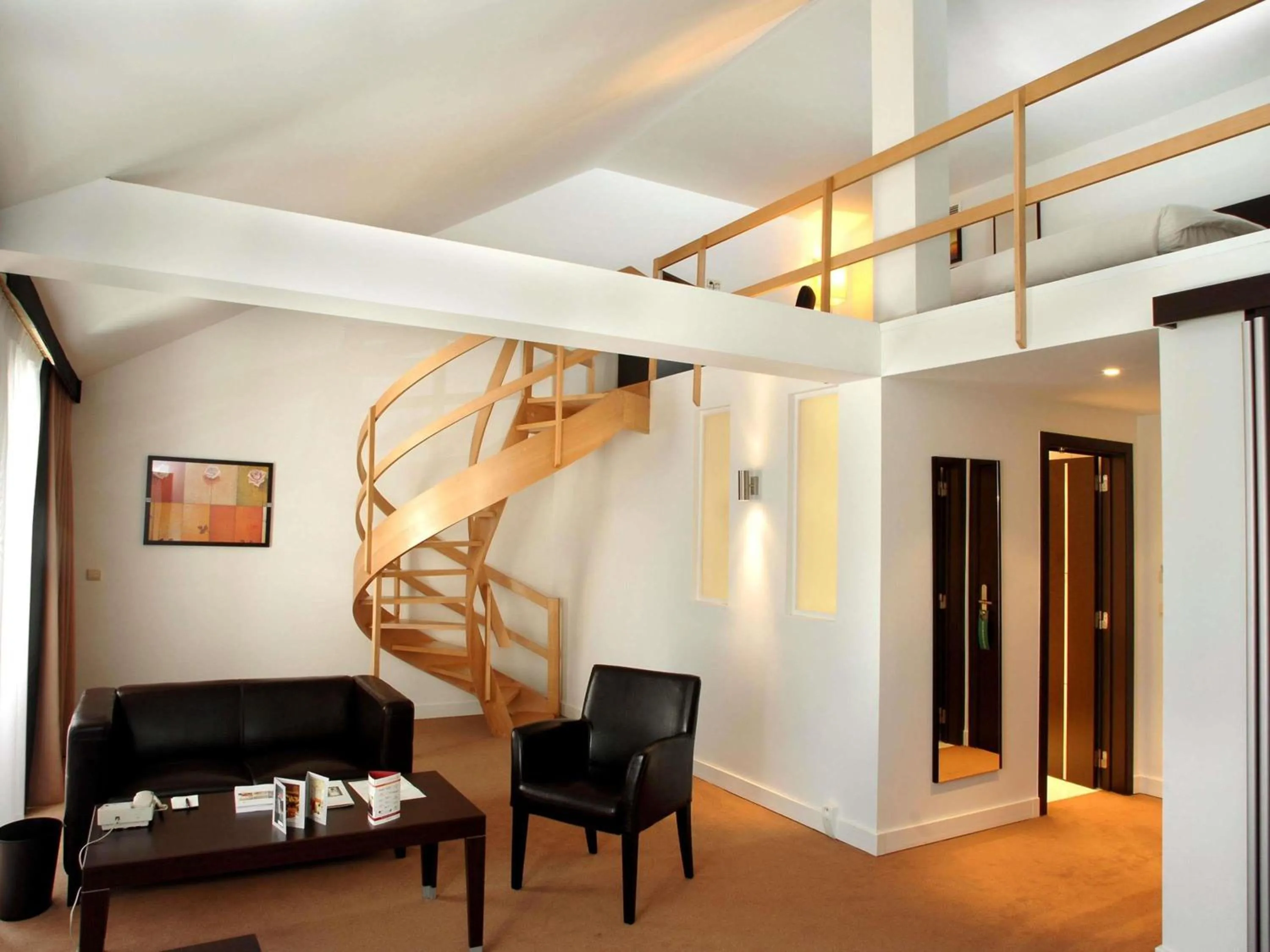 Bedroom in Hotel des Colonies Brussels by Mercure