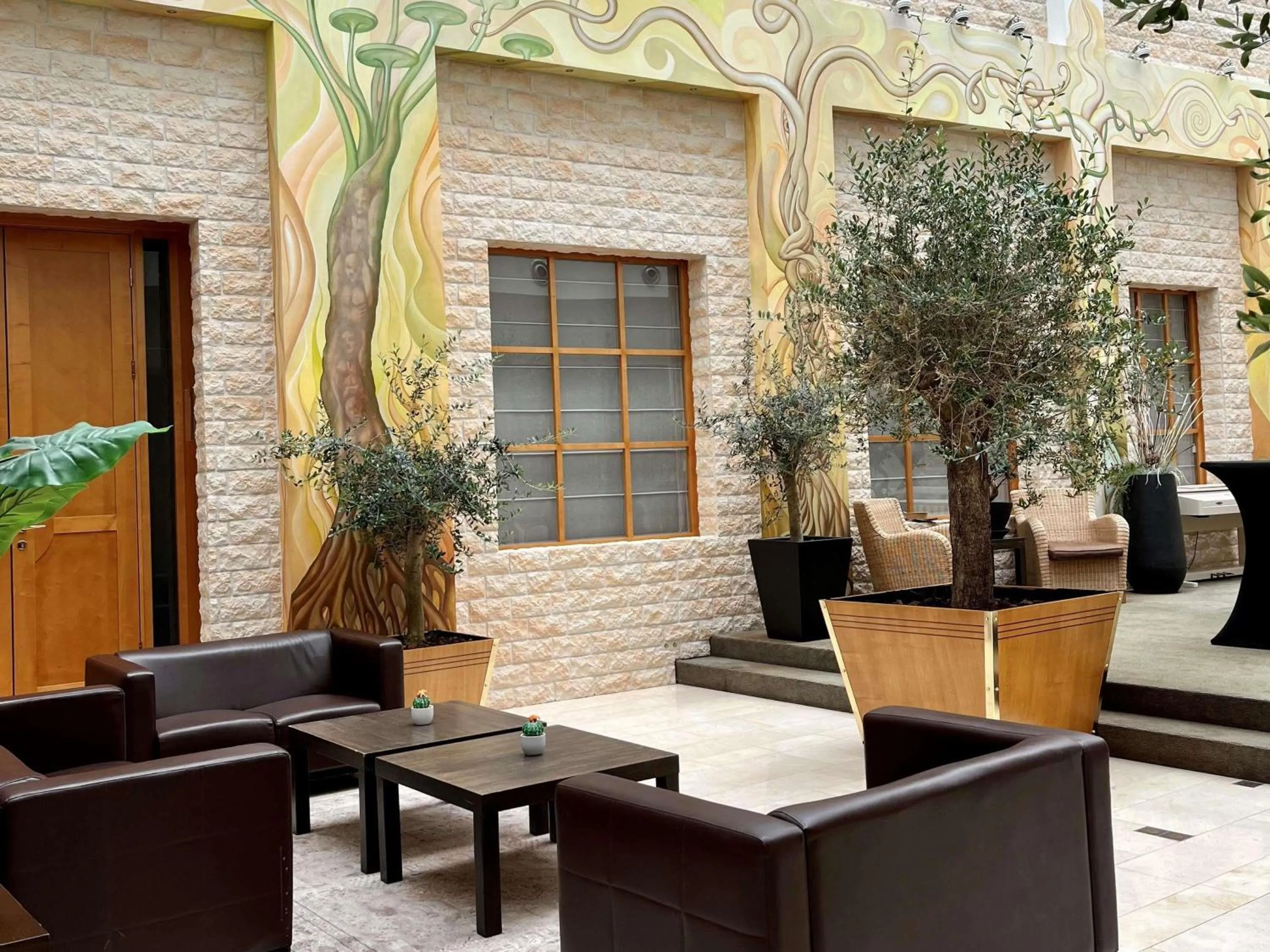 Property building in Hotel des Colonies Brussels by Mercure