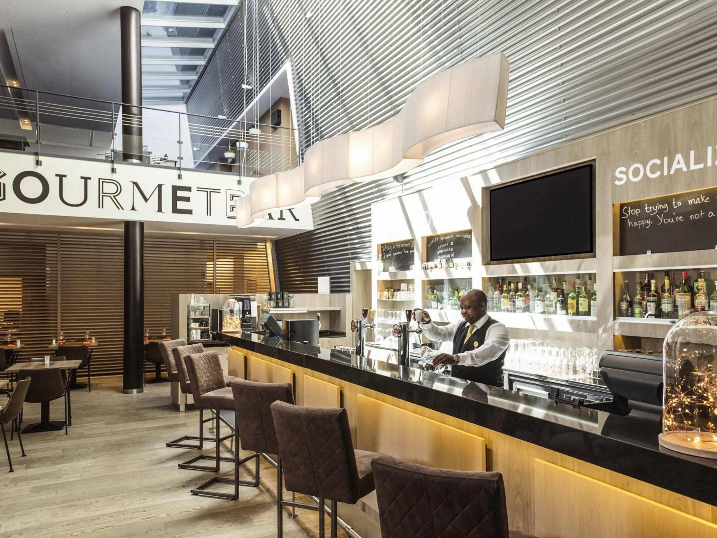 Lounge or bar in Novotel Mechelen Centrum