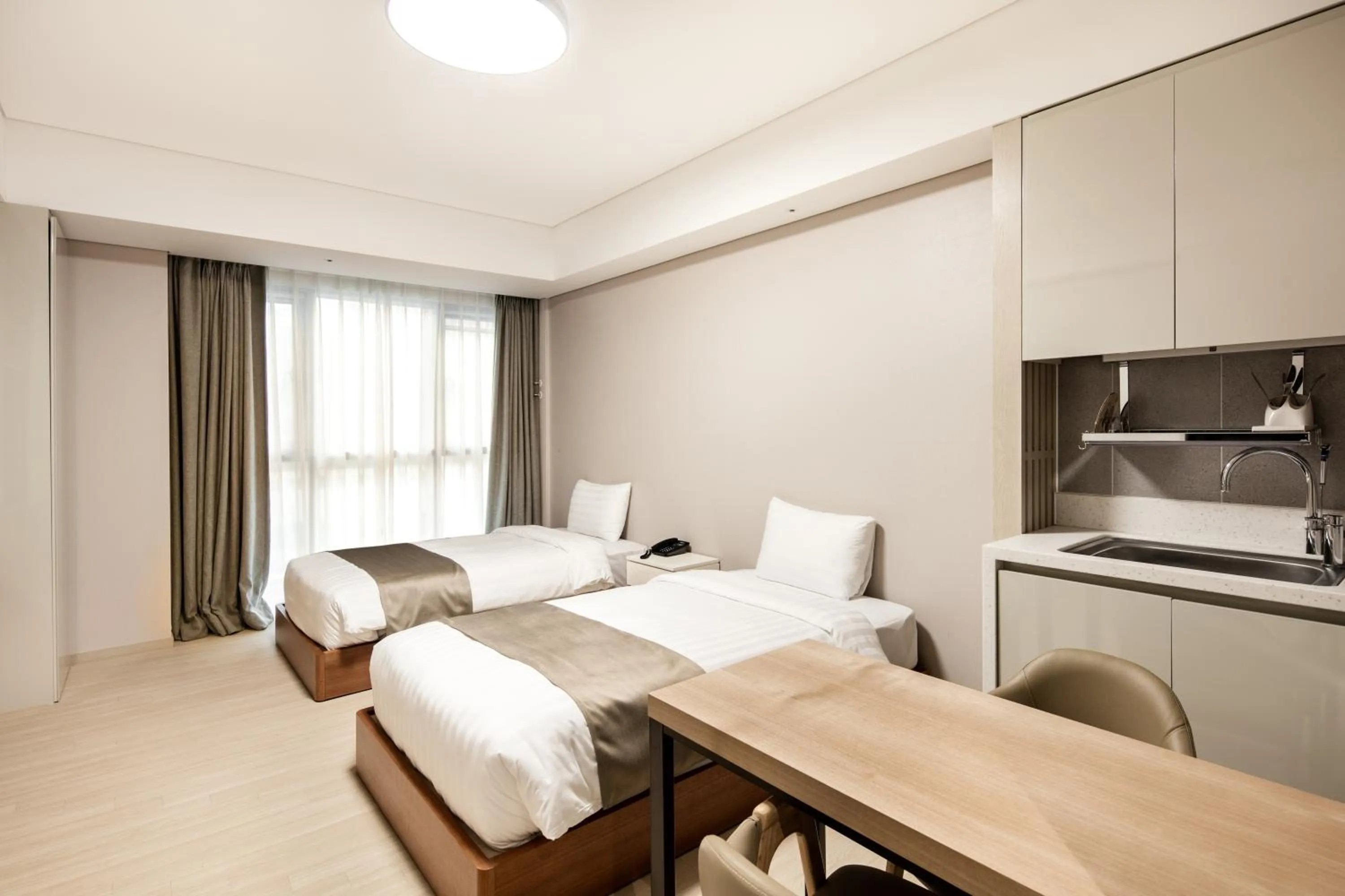 Bed in Golden Tulip Incheon Airport Hotel