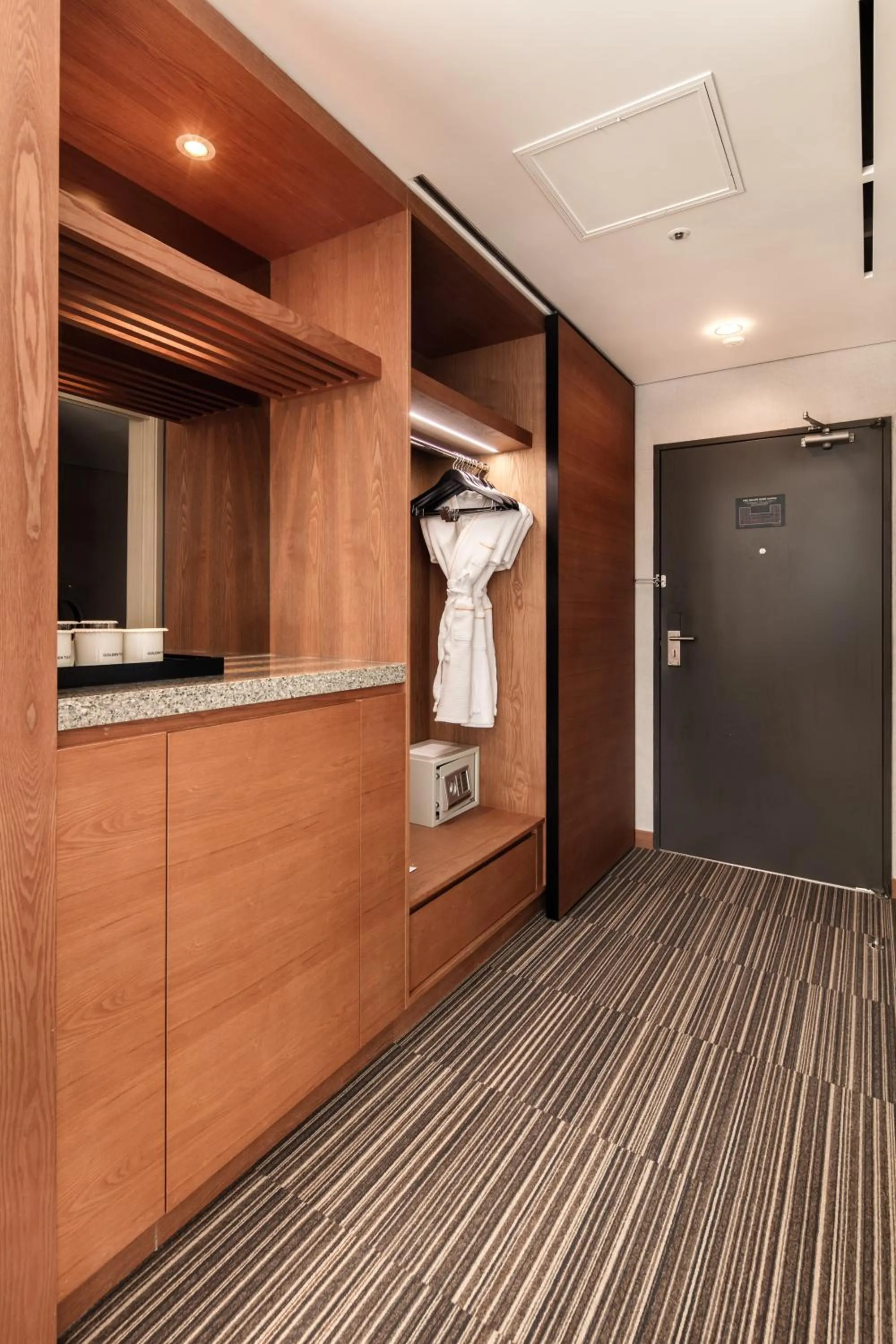 wardrobe in Golden Tulip Incheon Airport Hotel
