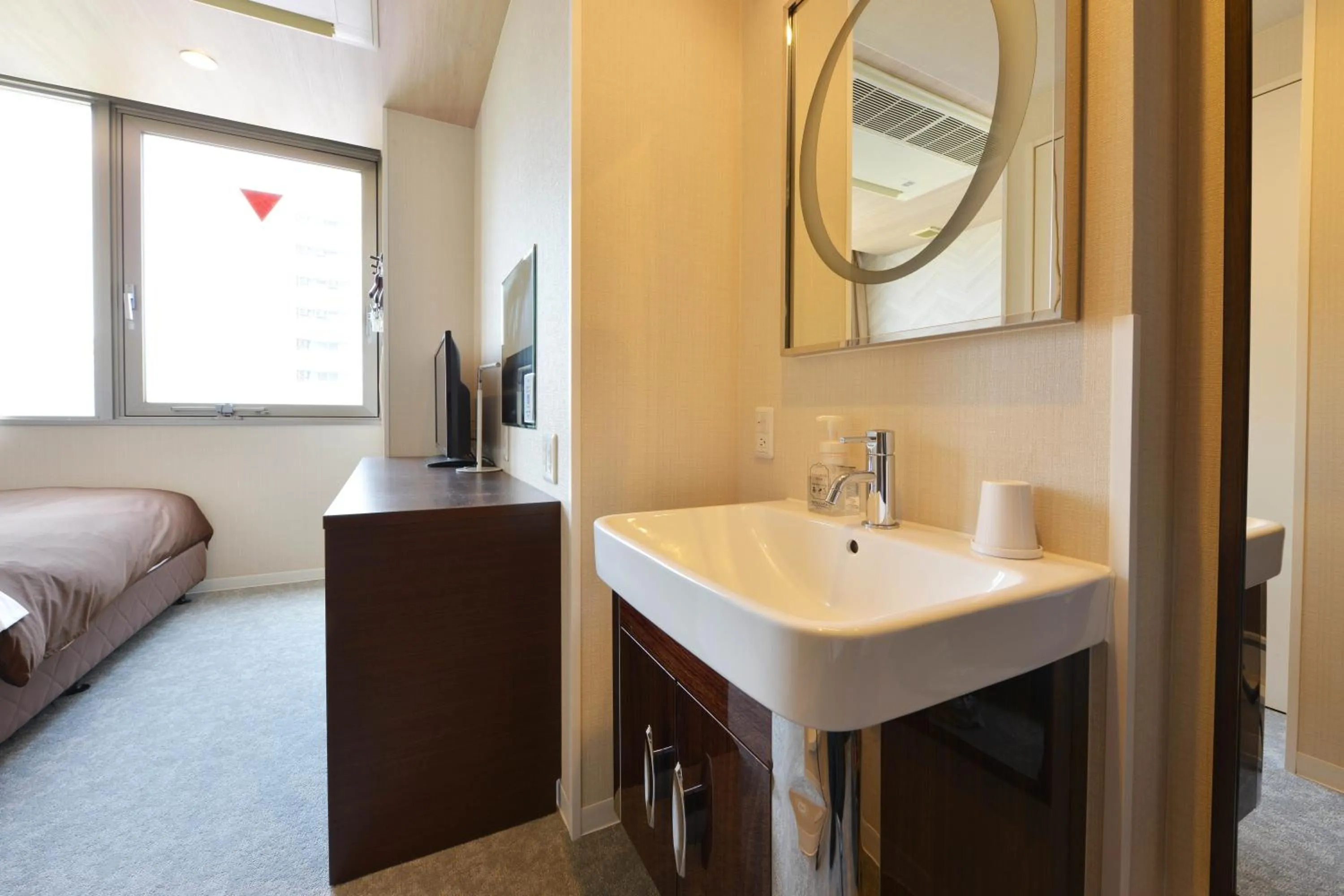 Photo of the whole room, Bed in Hotel New Gaea Domemae