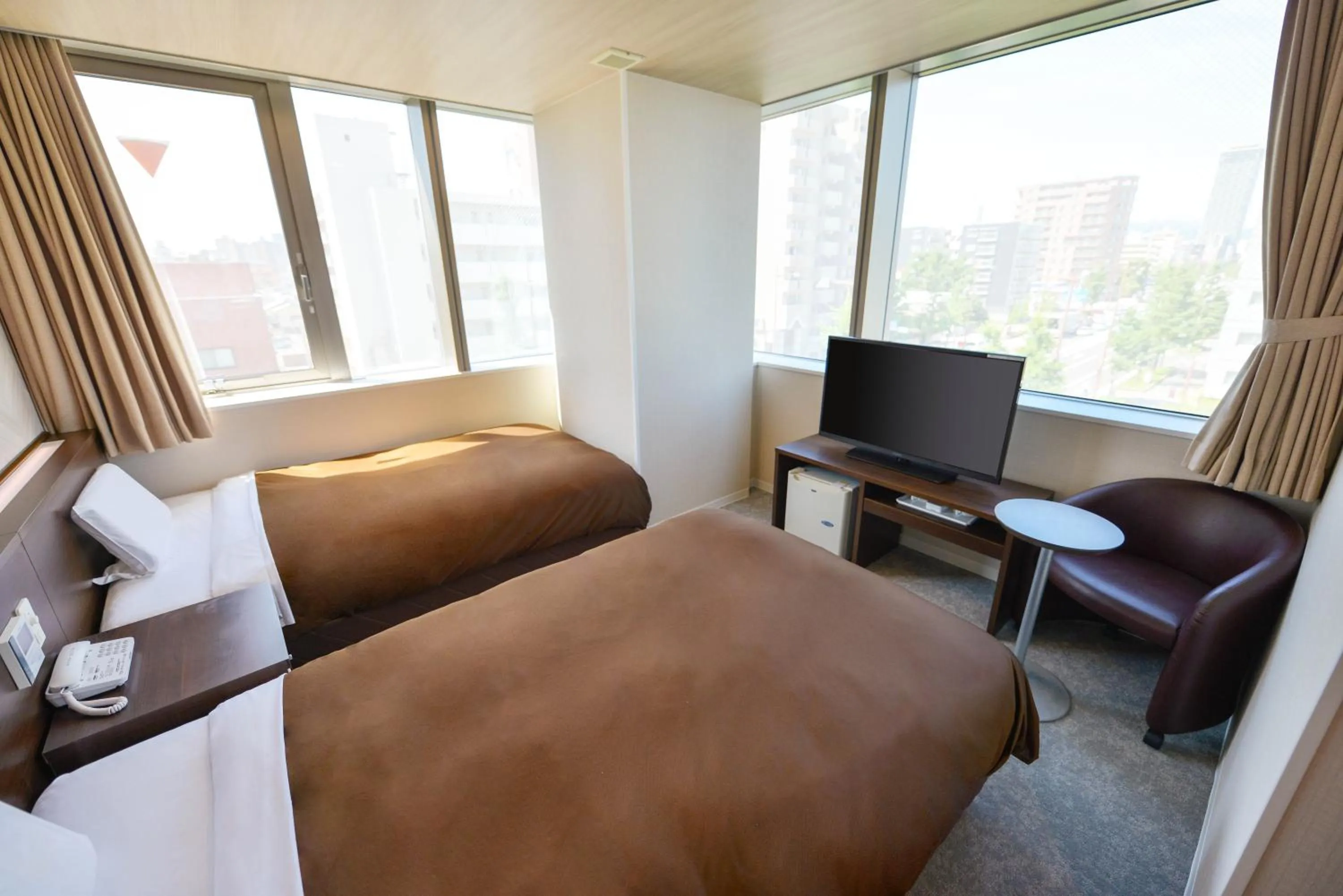 Photo of the whole room, Bed in Hotel New Gaea Domemae