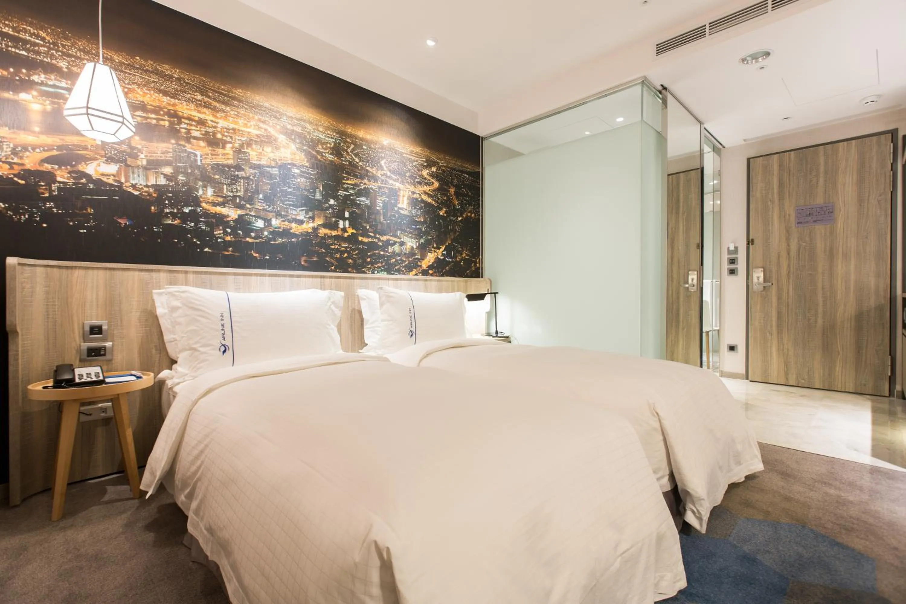 Photo of the whole room, Bed in Airline Inn - Kaohsiung Station