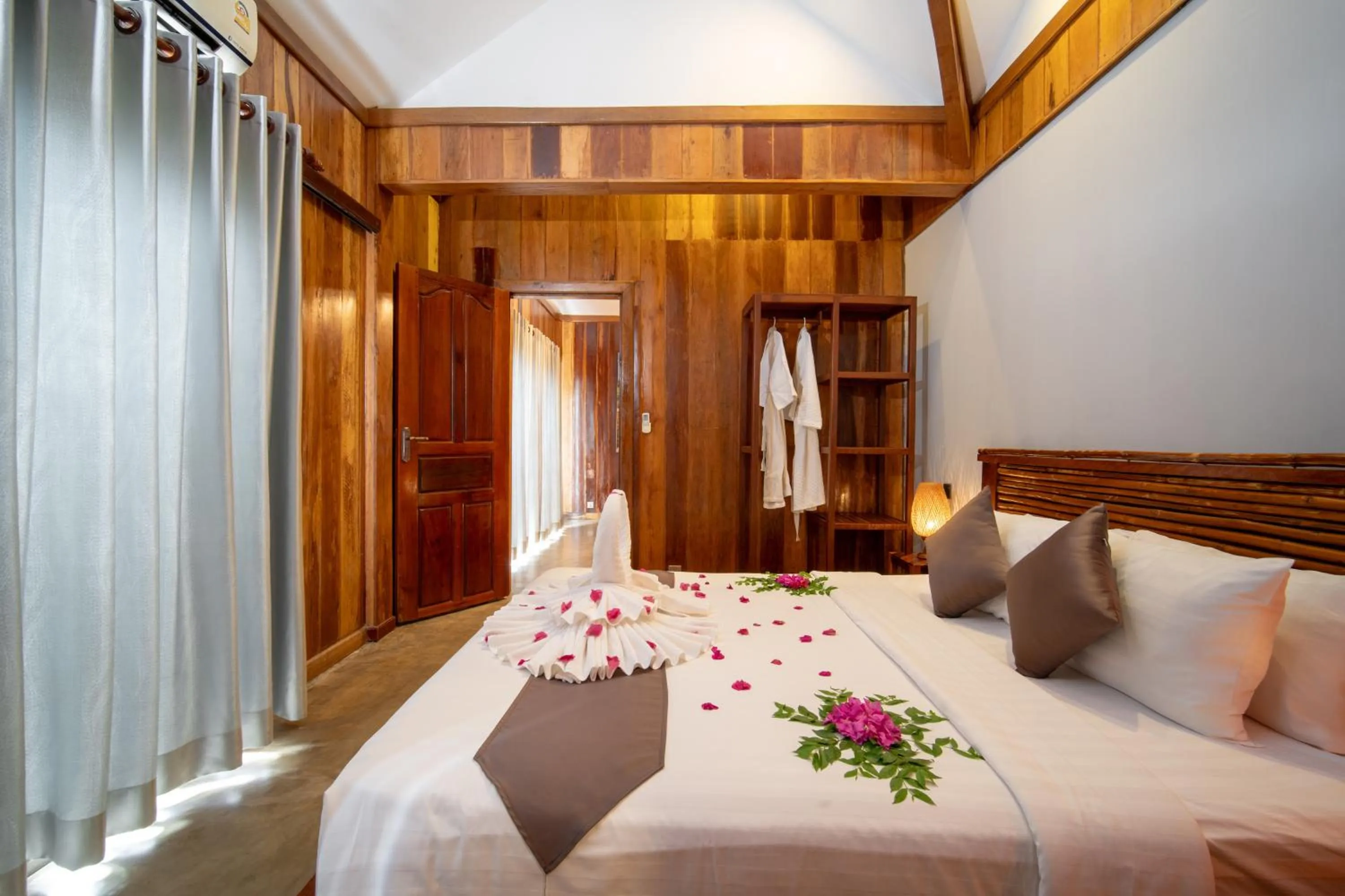 Bed in Authentic Khmer Village Resort