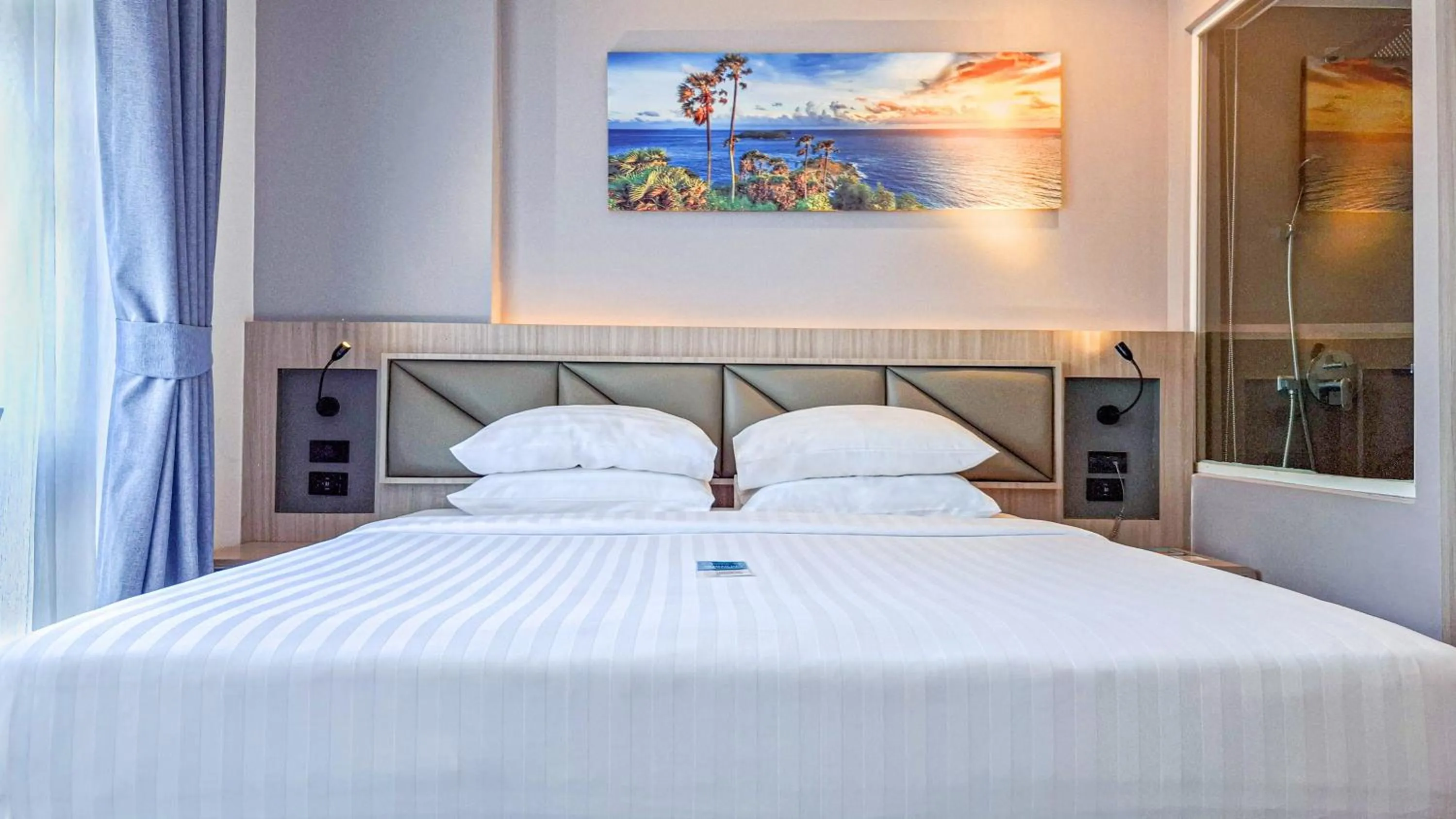 Bed in Clarian Hotel Beach Patong