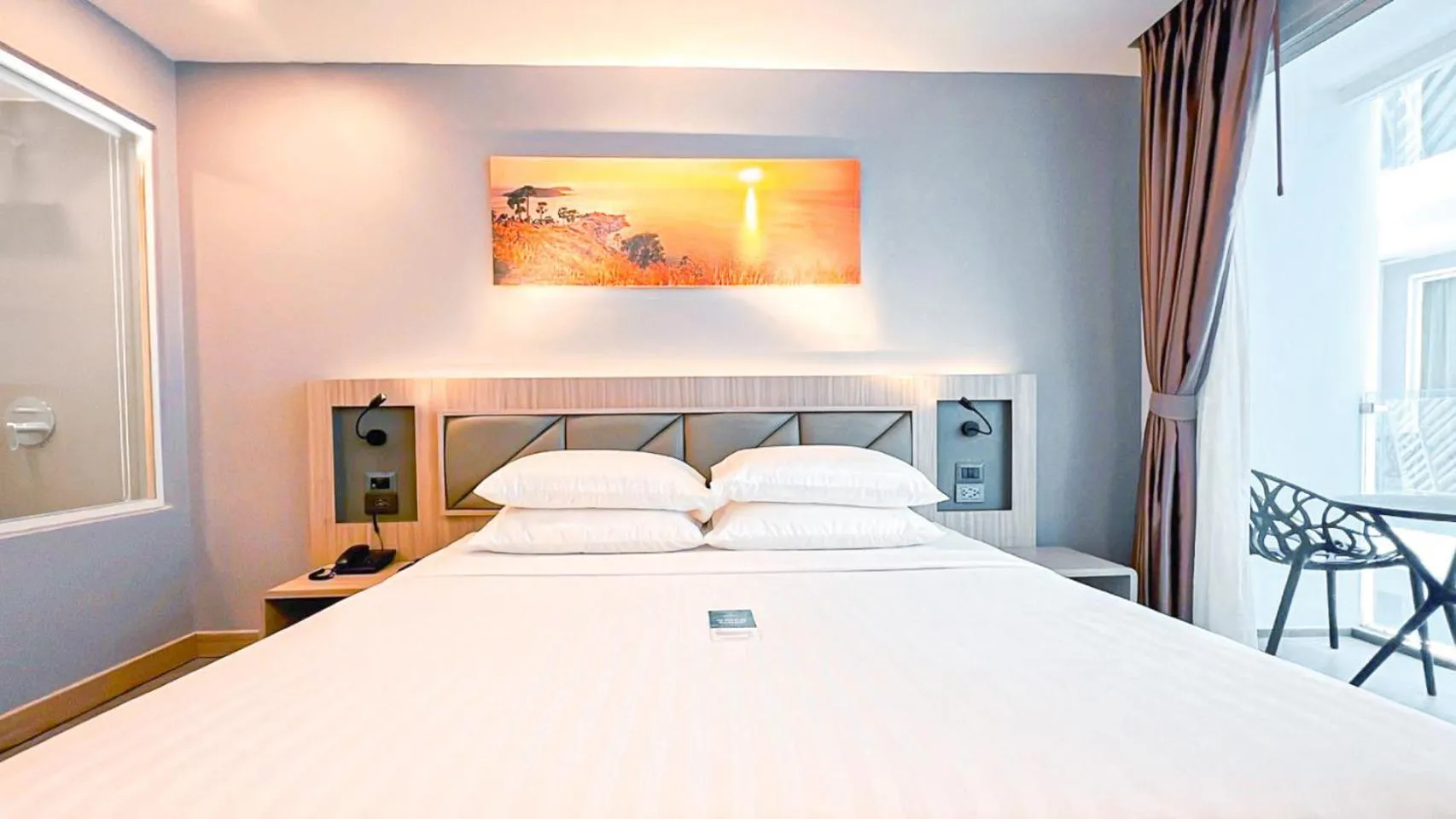 Bed in Clarian Hotel Beach Patong