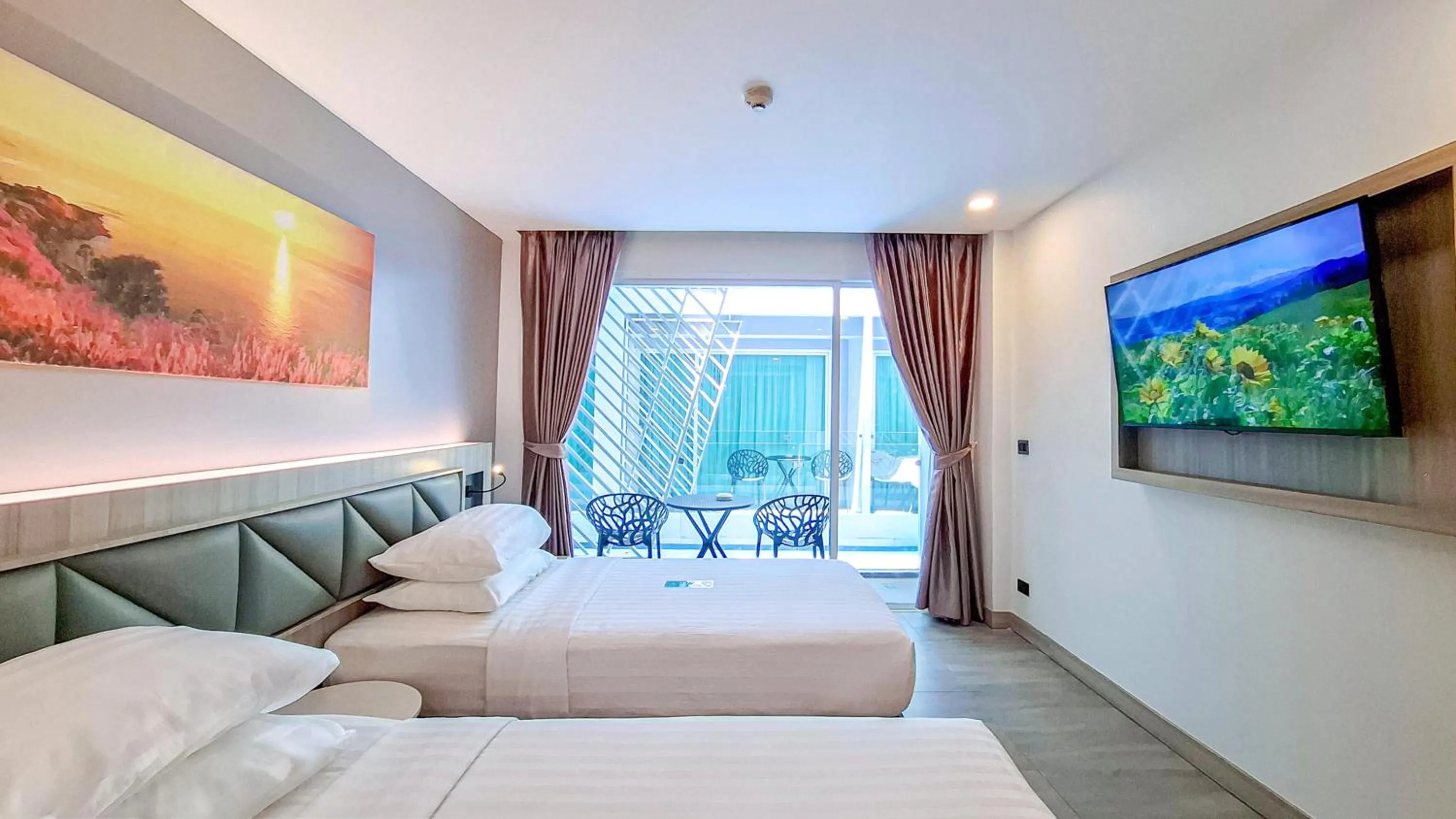 Bed in Clarian Hotel Beach Patong